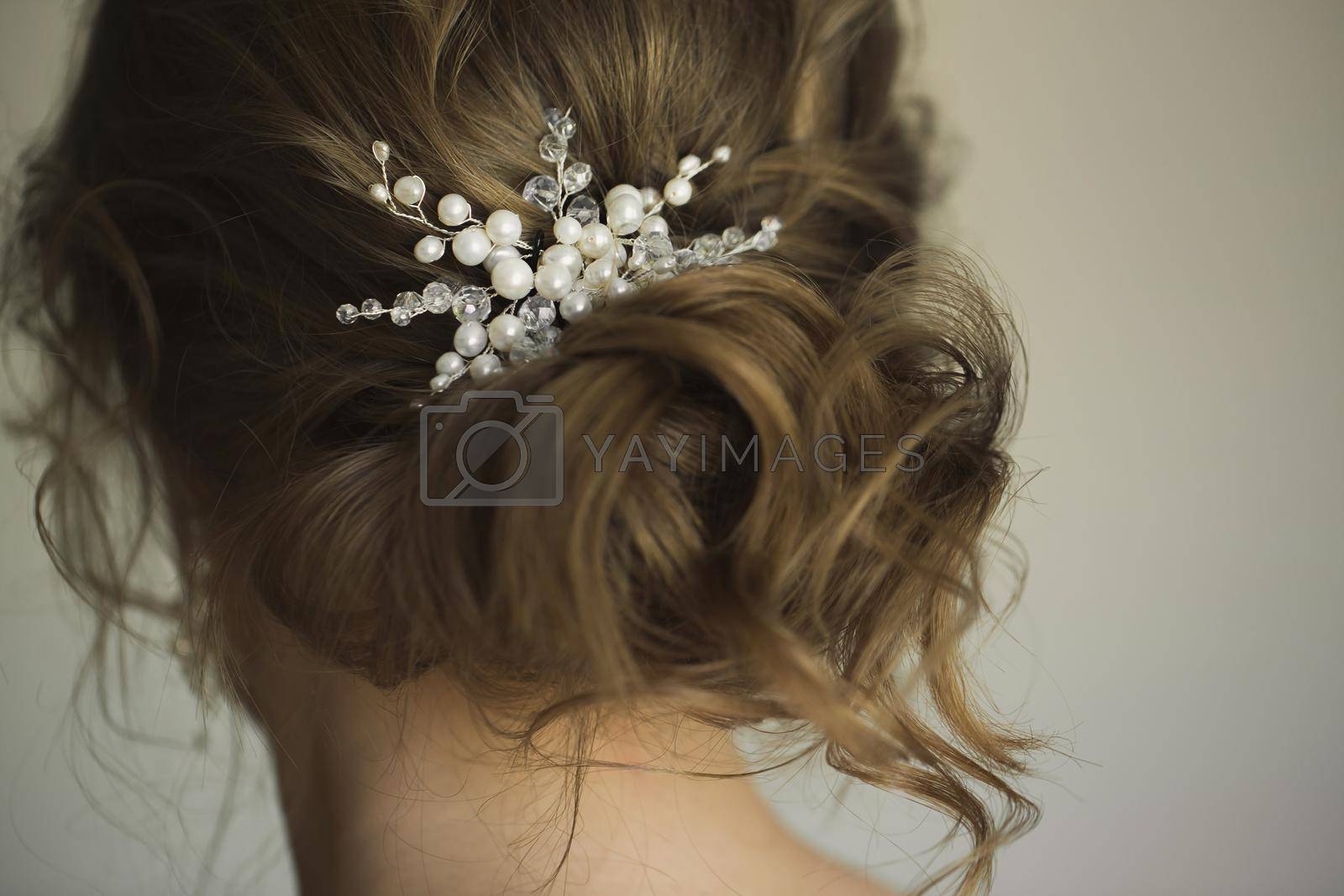 Royalty free image of Bridal wedding hairstyle with jewelry. Elegant hair accessorie by StudioPeace