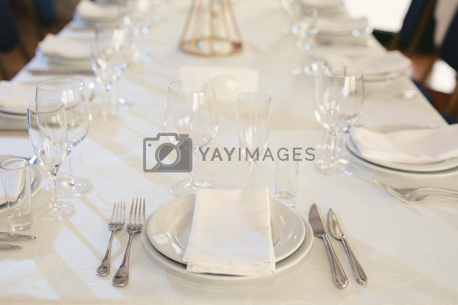 Royalty free image of Beautiful setting of the wedding banquet table in the restaurant by StudioPeace
