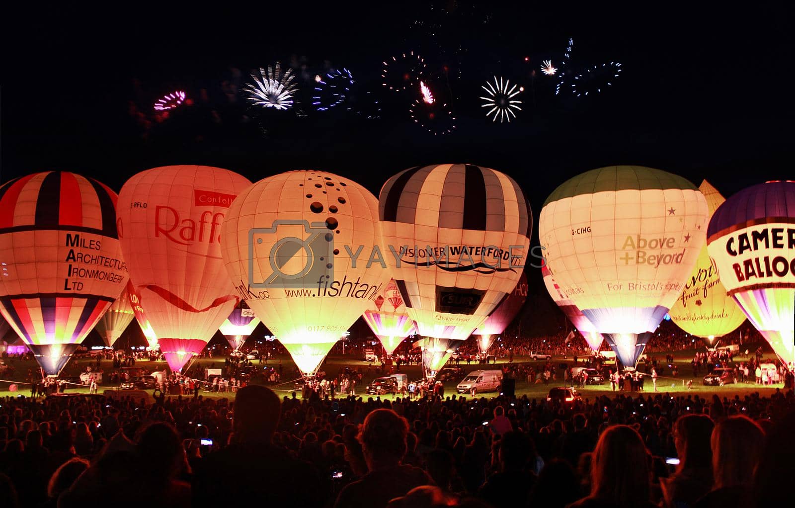 Bristol balloons lined up for the festival fireworks celebration at night, Bristol, UK. High quality photo.