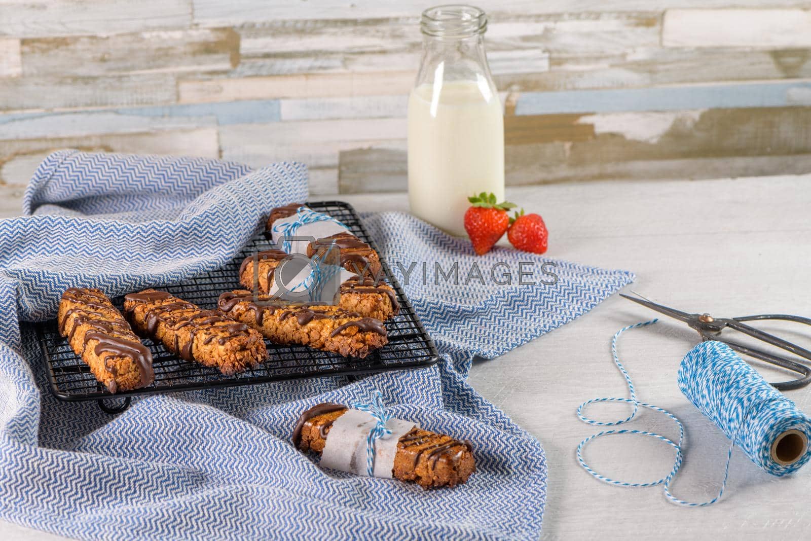 Royalty free image of Cereal bars with peanuts and chocolate by homydesign