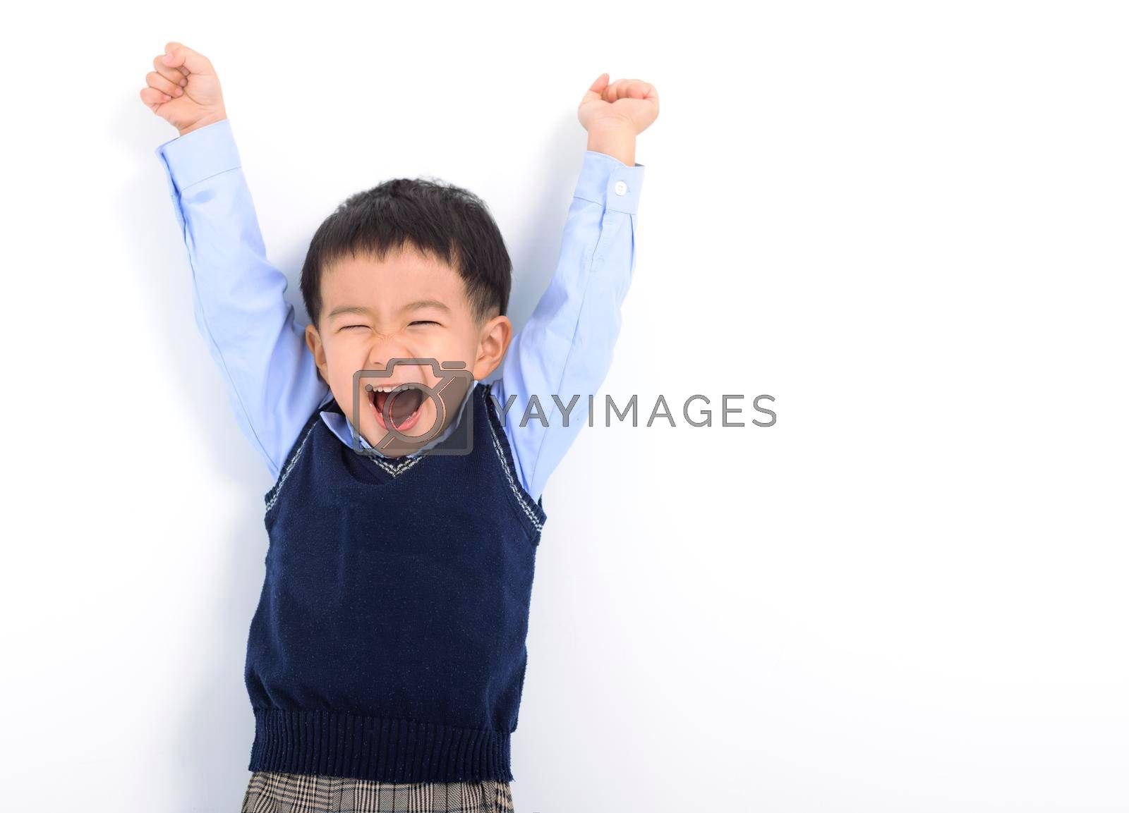 Royalty free image of Happy Kid boy having fun on white background by tomwang