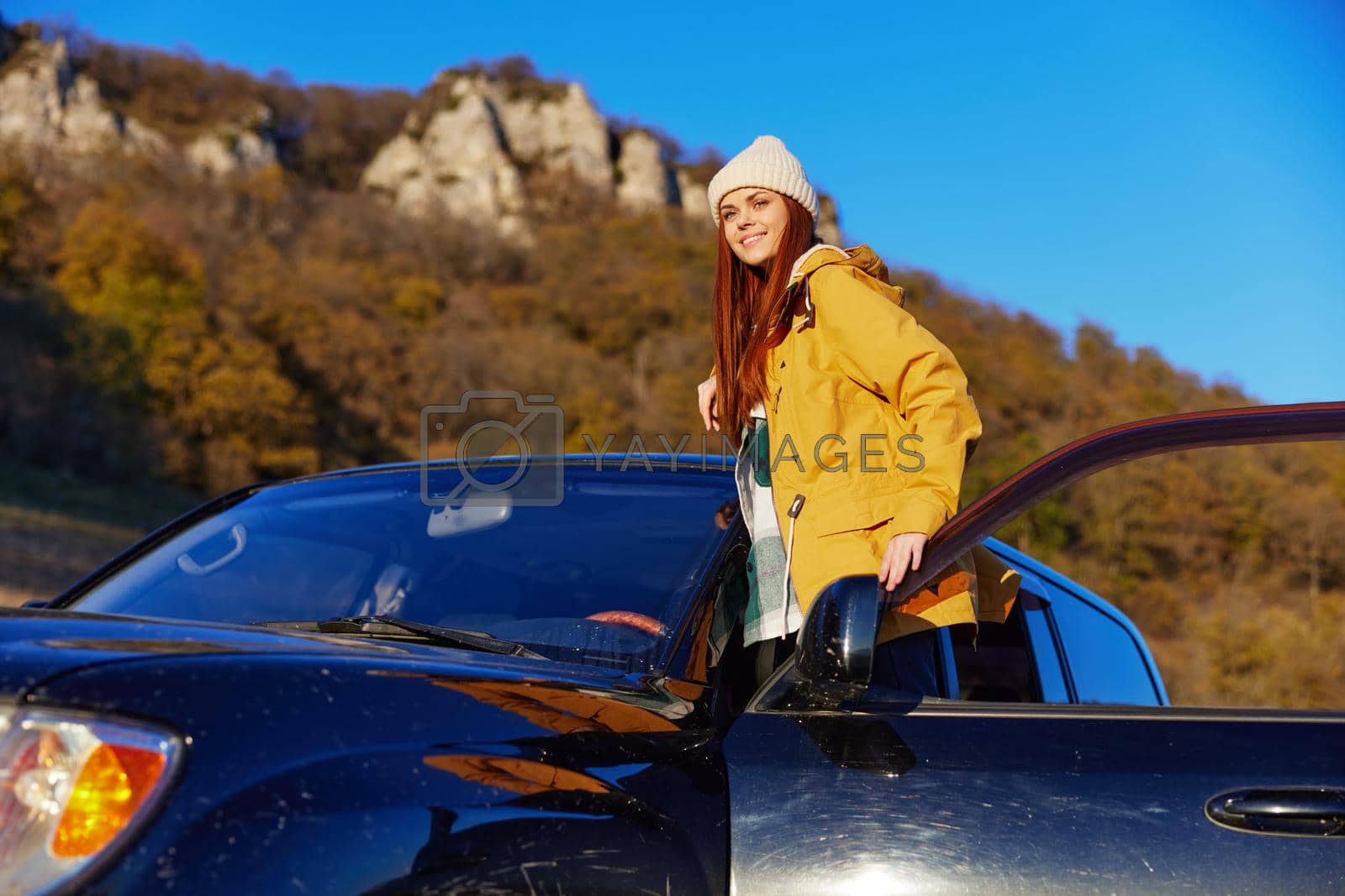 woman tourist black car nature travel adventure relaxation. High quality photo