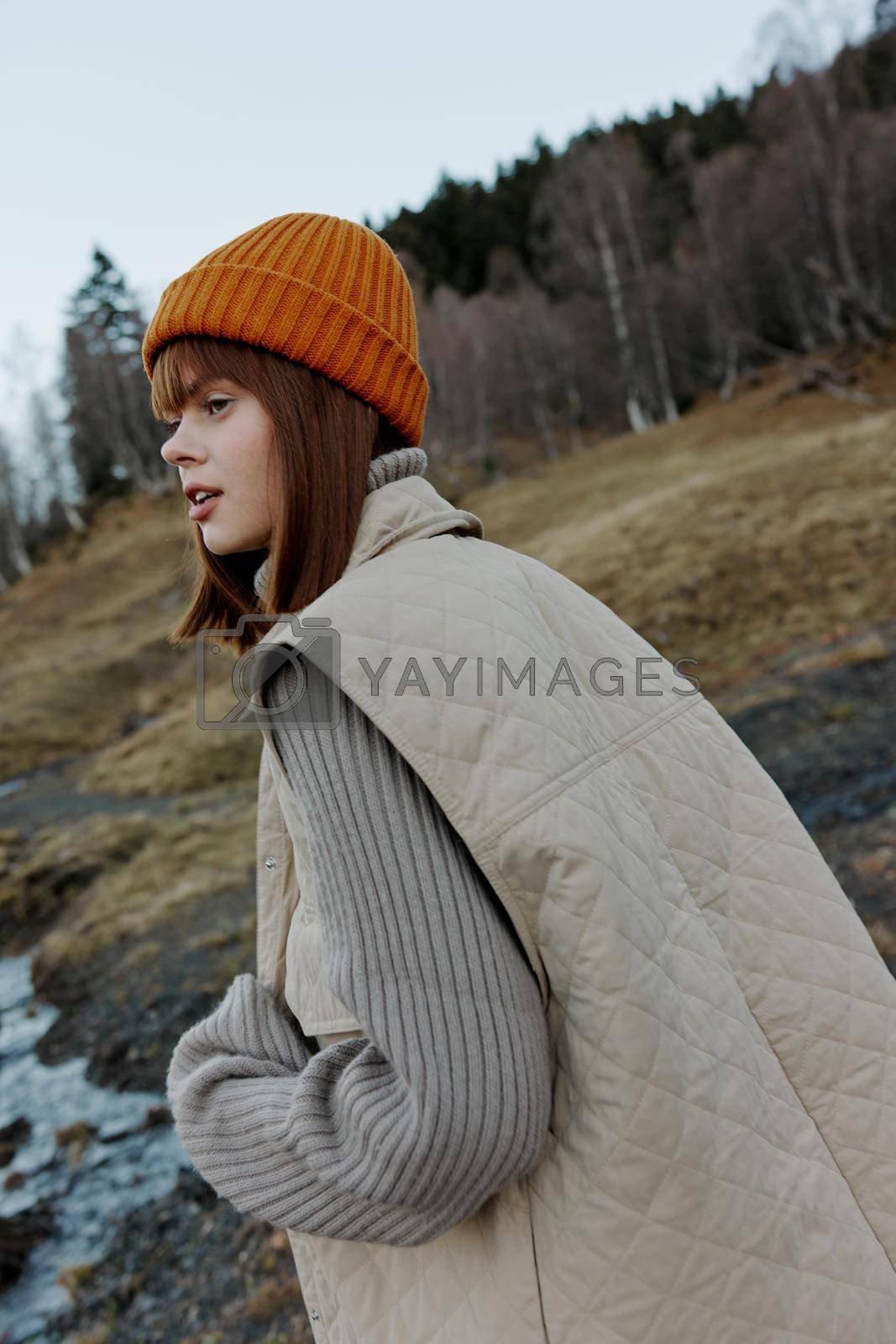 woman in the autumn forest walk fresh air travel landscape. High quality photo