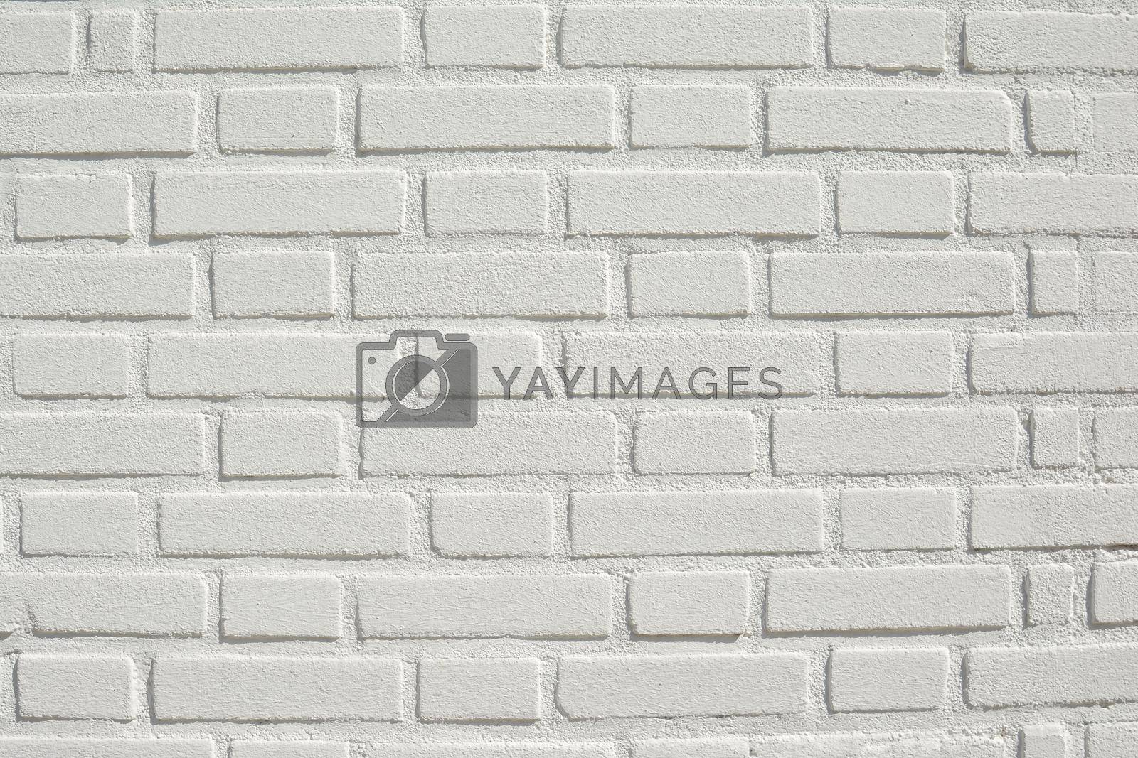 White brick wall background and texture Sun day