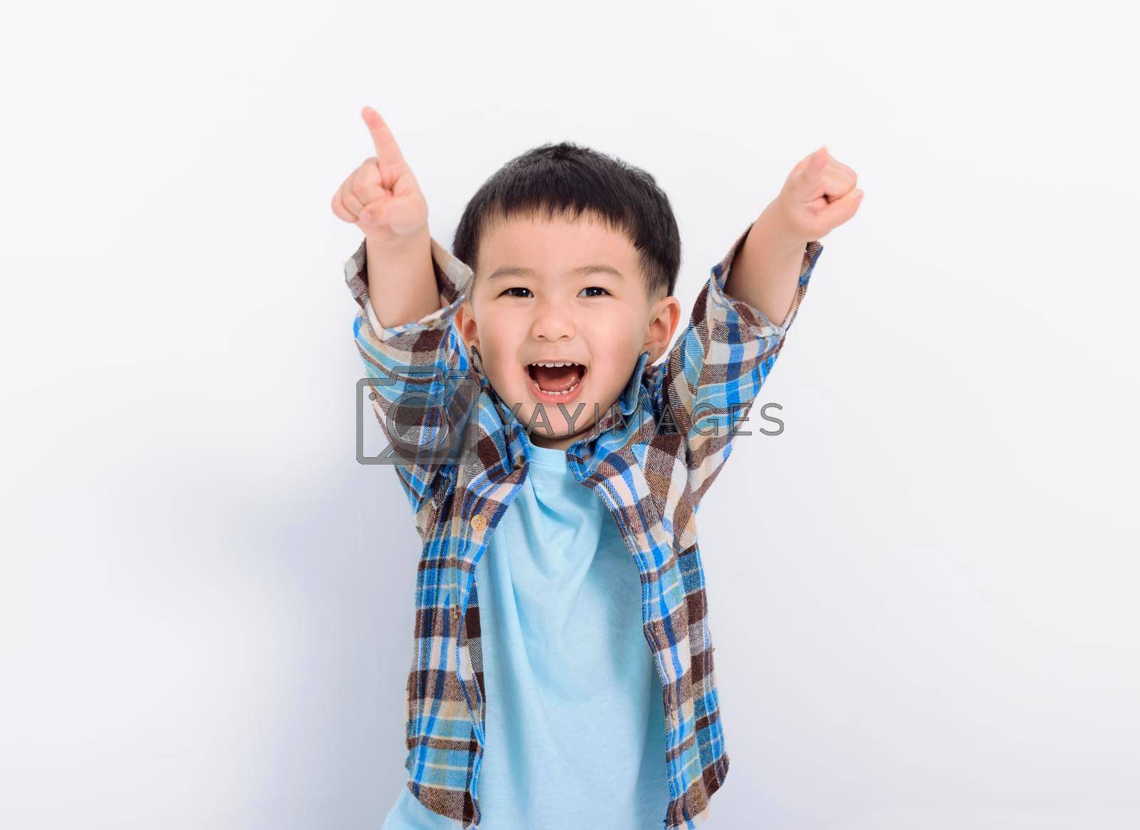 Royalty free image of Happy little boy hand pointing to camera by tomwang
