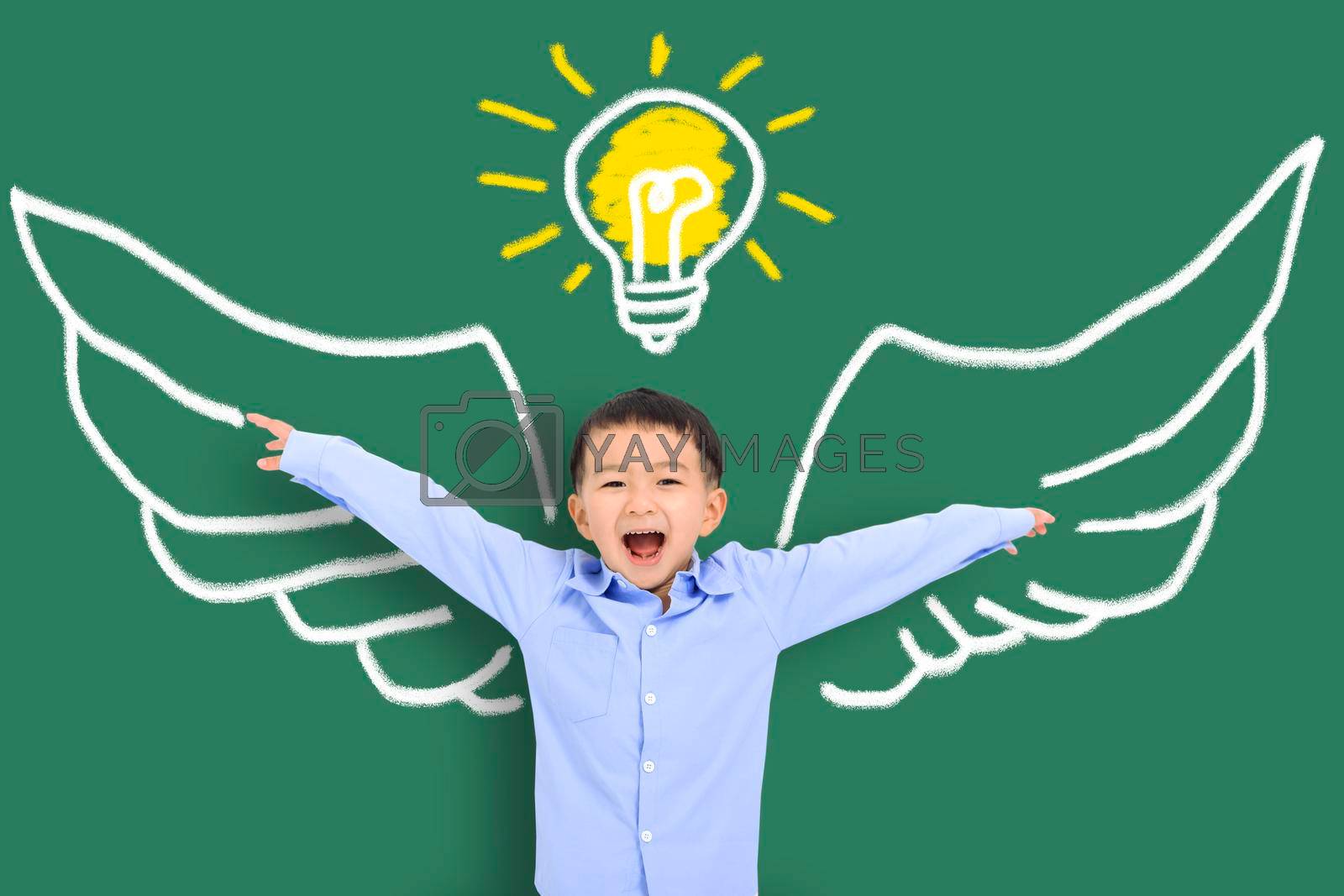 Royalty free image of Smart kid with wing in class. Imagination, idea and success concept by tomwang