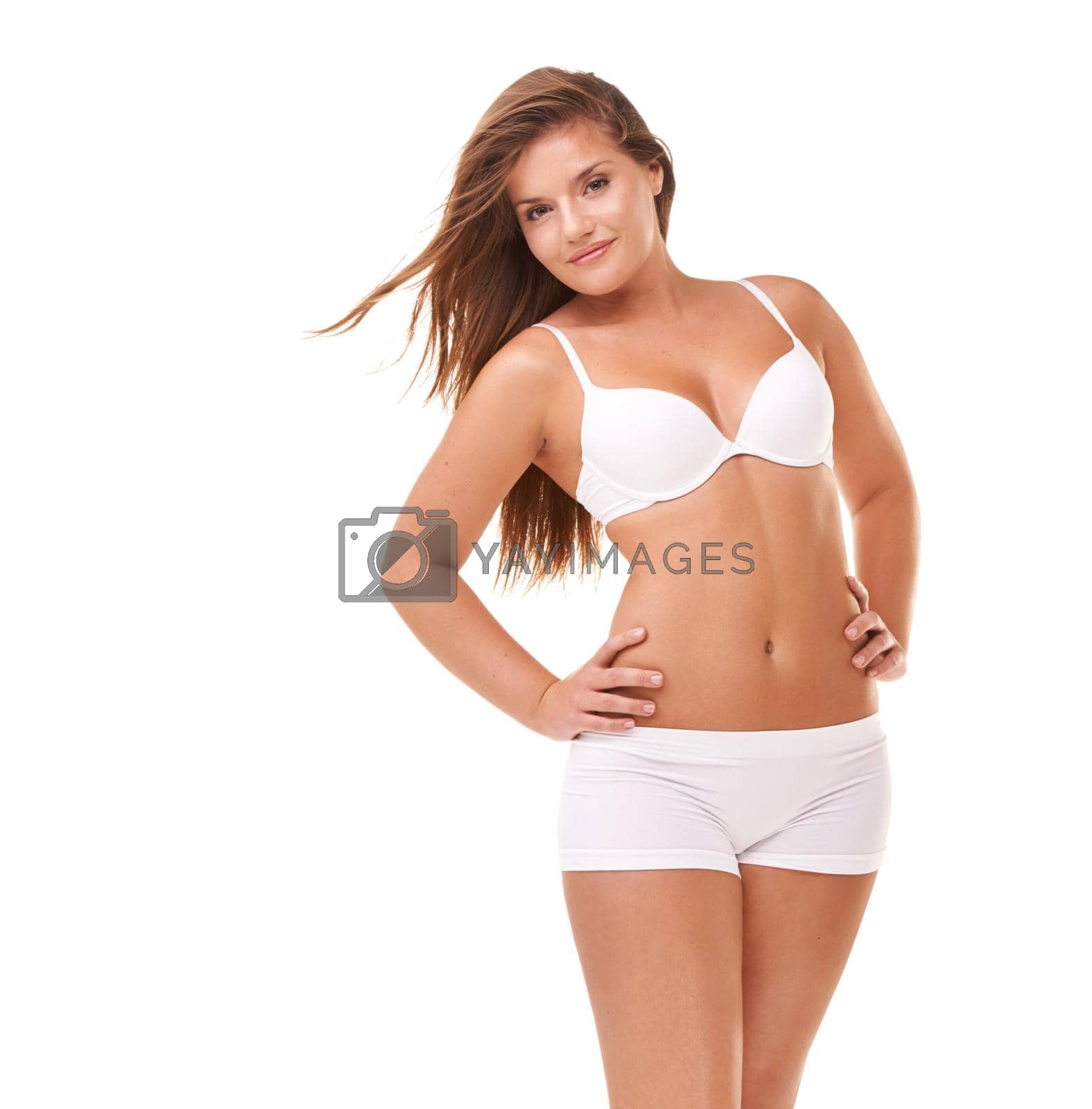 Royalty free image of Her confidence is all natural. Full-length portrait of a confident young woman posing in her underwear. by YuriArcurs