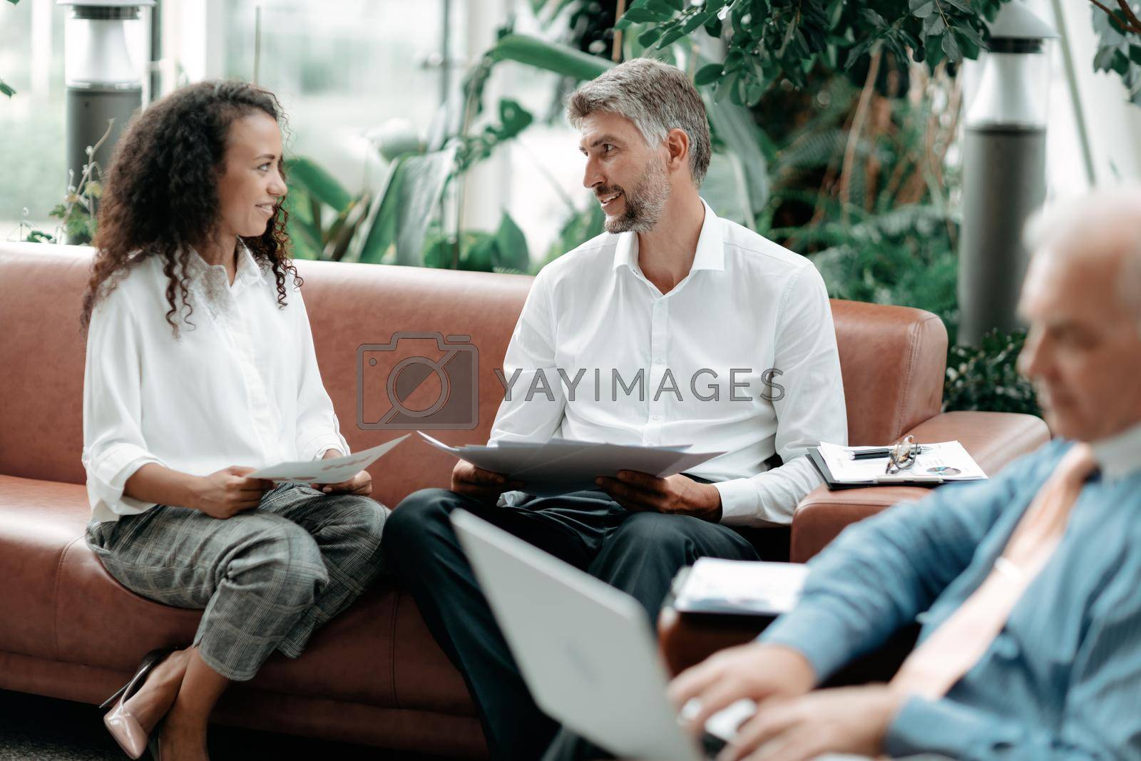 businessman and businesswoman discussing business and financial documents . business concept.