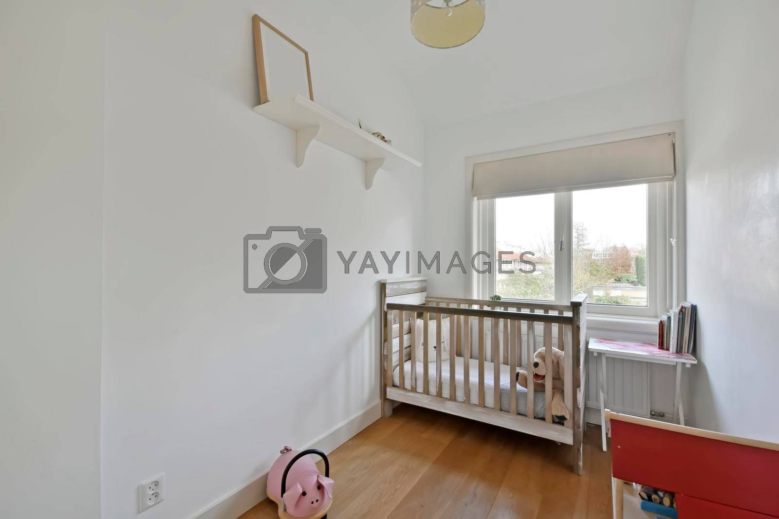 Small children's room for toddlers with a small bed