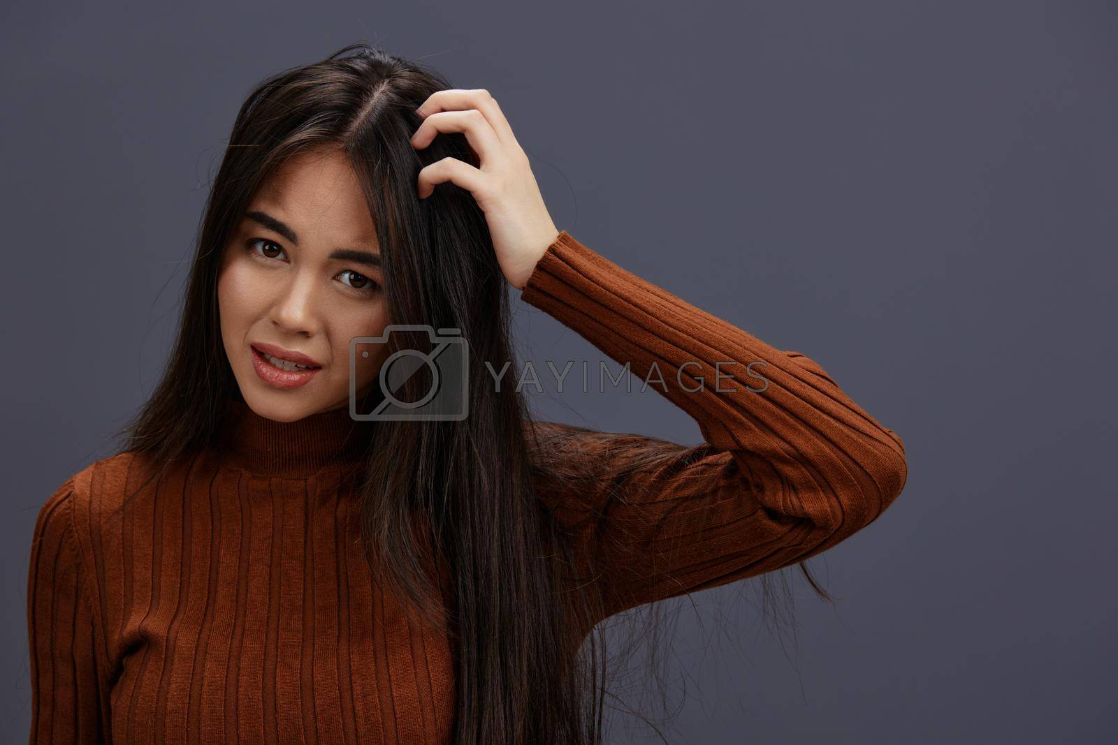 Brunette brown sweater glamor posing smile fashion Lifestyle. High quality photo