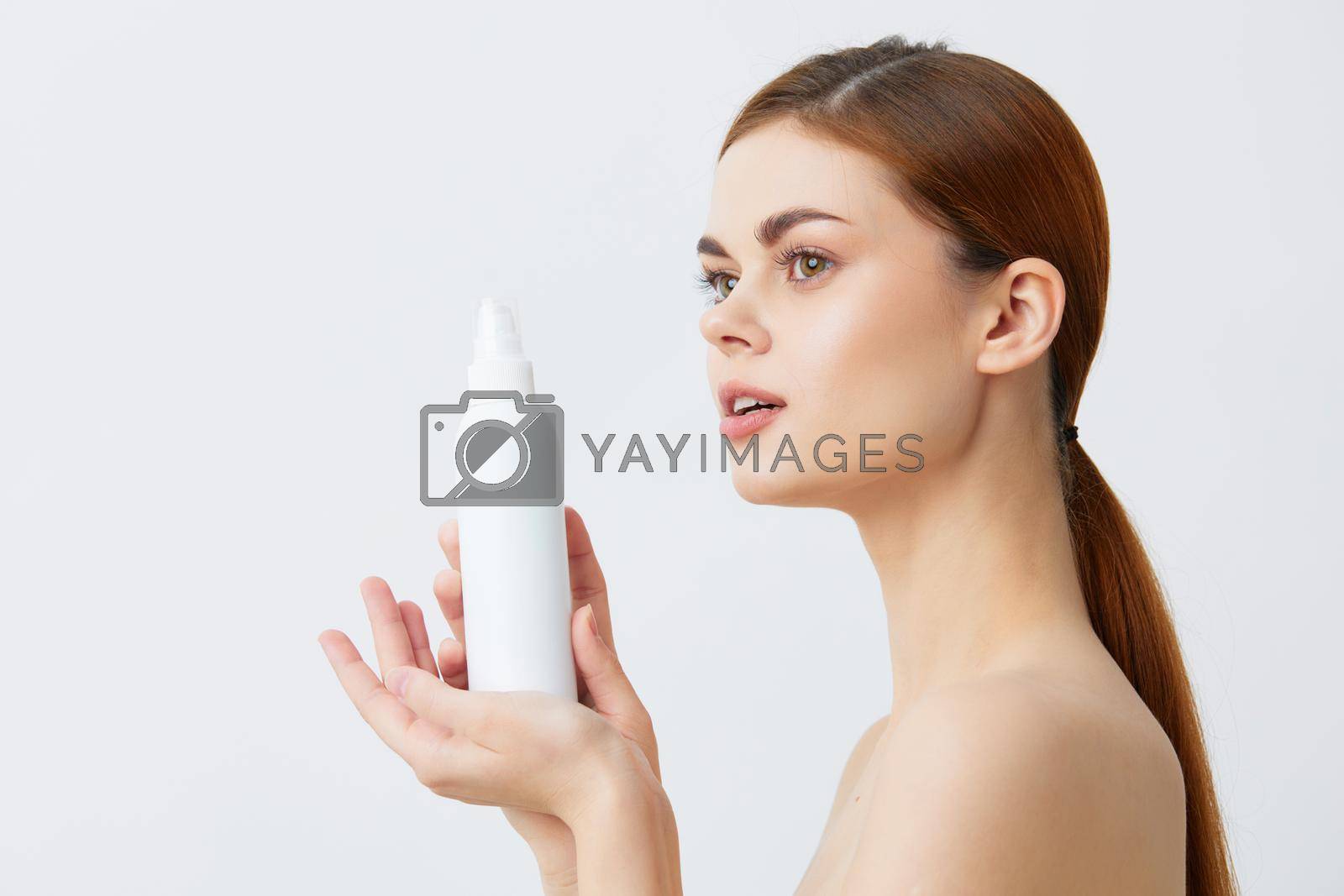 Royalty free image of woman body lotion rejuvenation cosmetics close-up Lifestyle by SHOTPRIME