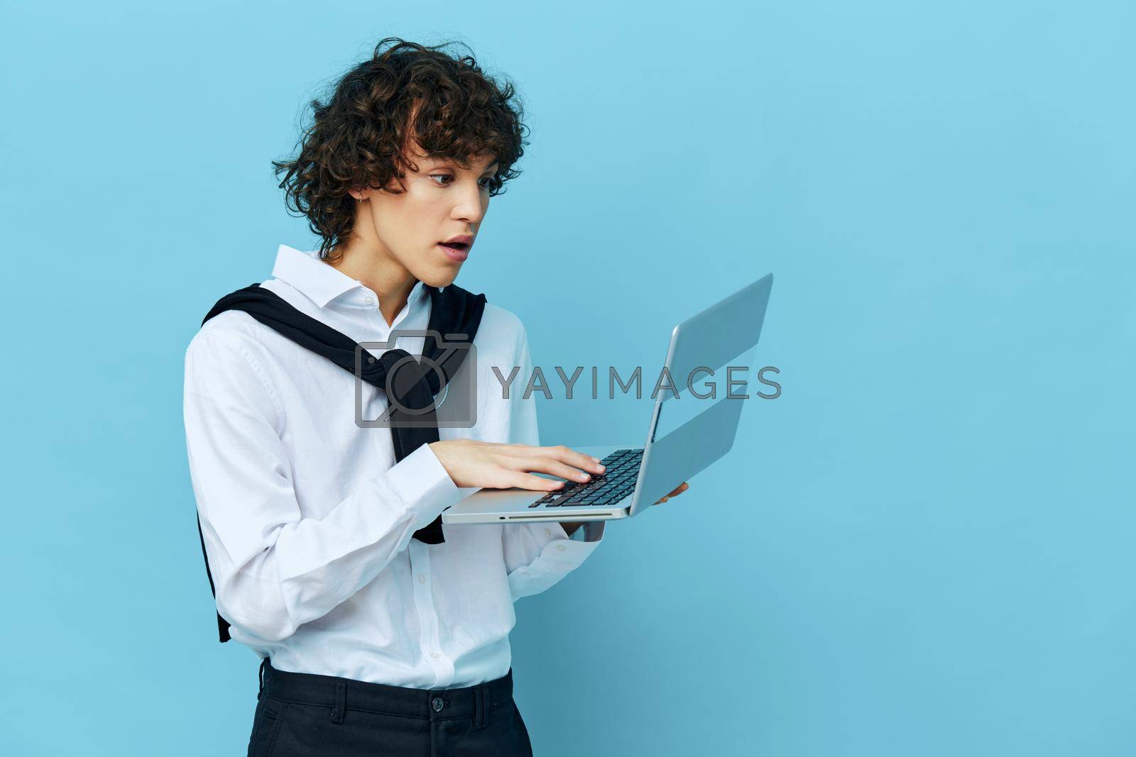 curly guy laptop online chat communication Internet Lifestyle technologies. High quality photo
