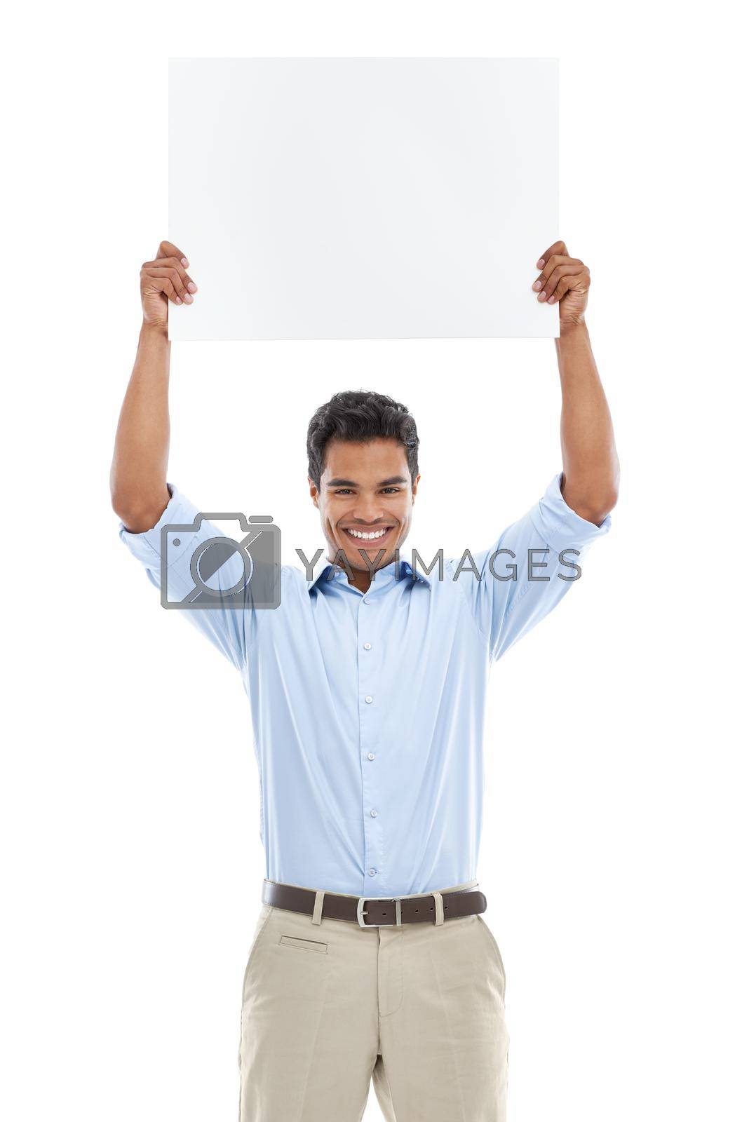 Royalty free image of How do you like this idea. Studio shot of a young man holding a blank card for copyspace isolated on white. by YuriArcurs