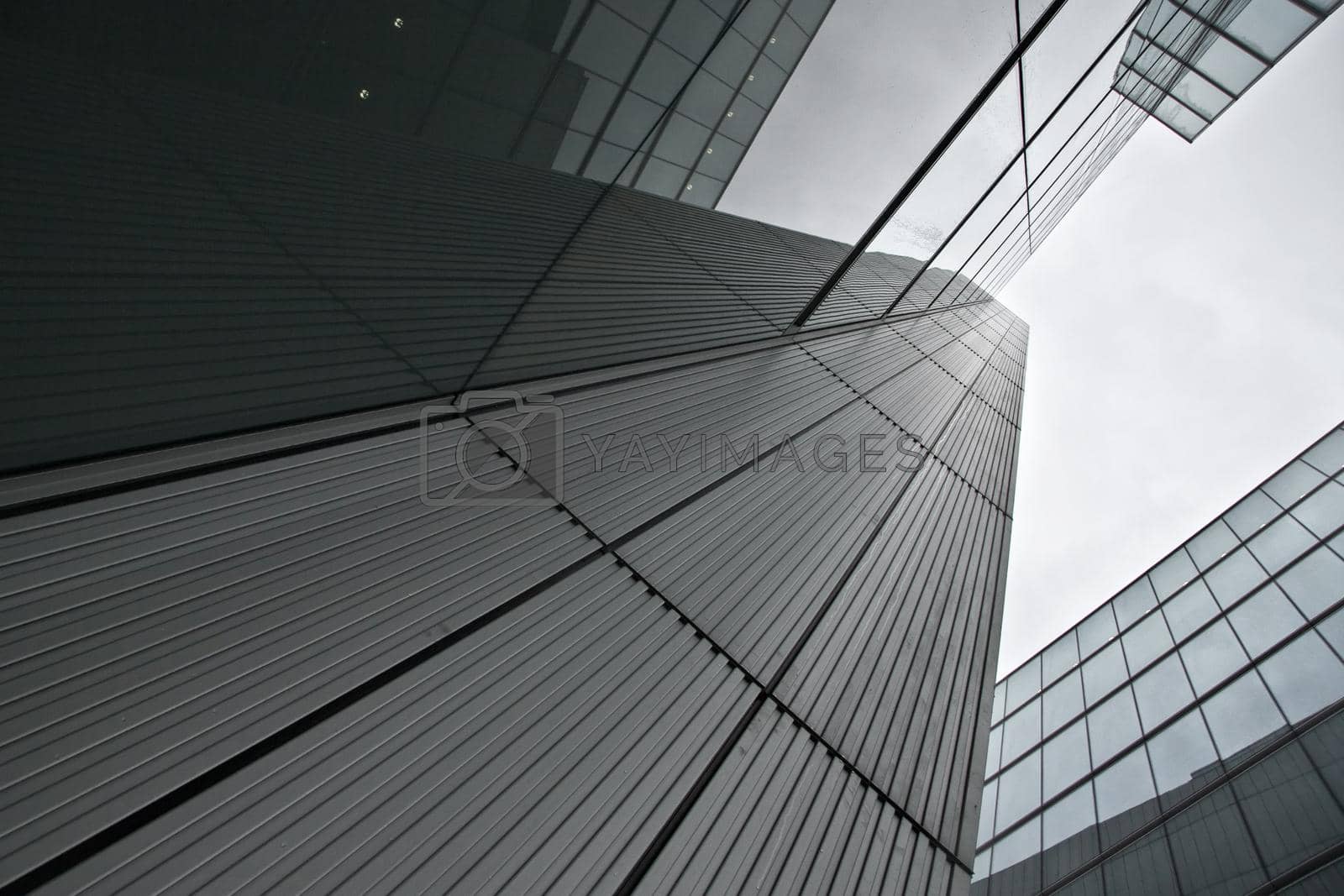 London, United Kingdom - October 22, 2006: Glass and steel offices ("More London Estates" design by Foster and Partners) overcast sky in background. Example of modern architecture in UK capital