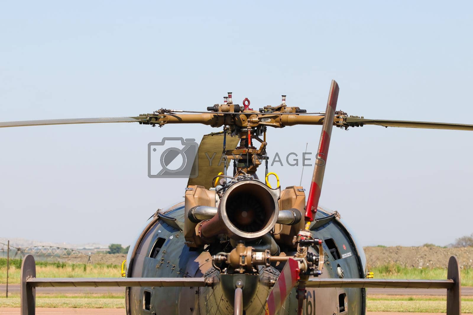 Royalty free image of Alouette III Helicopter With Engine And Rotor Rear View by jjvanginkel