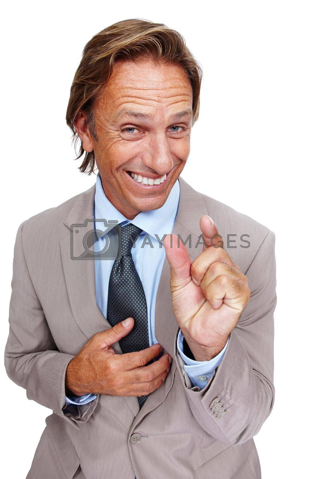 Royalty free image of Just kidding. An isolated portrait of a businessman humourously indicating size with his hand. by YuriArcurs