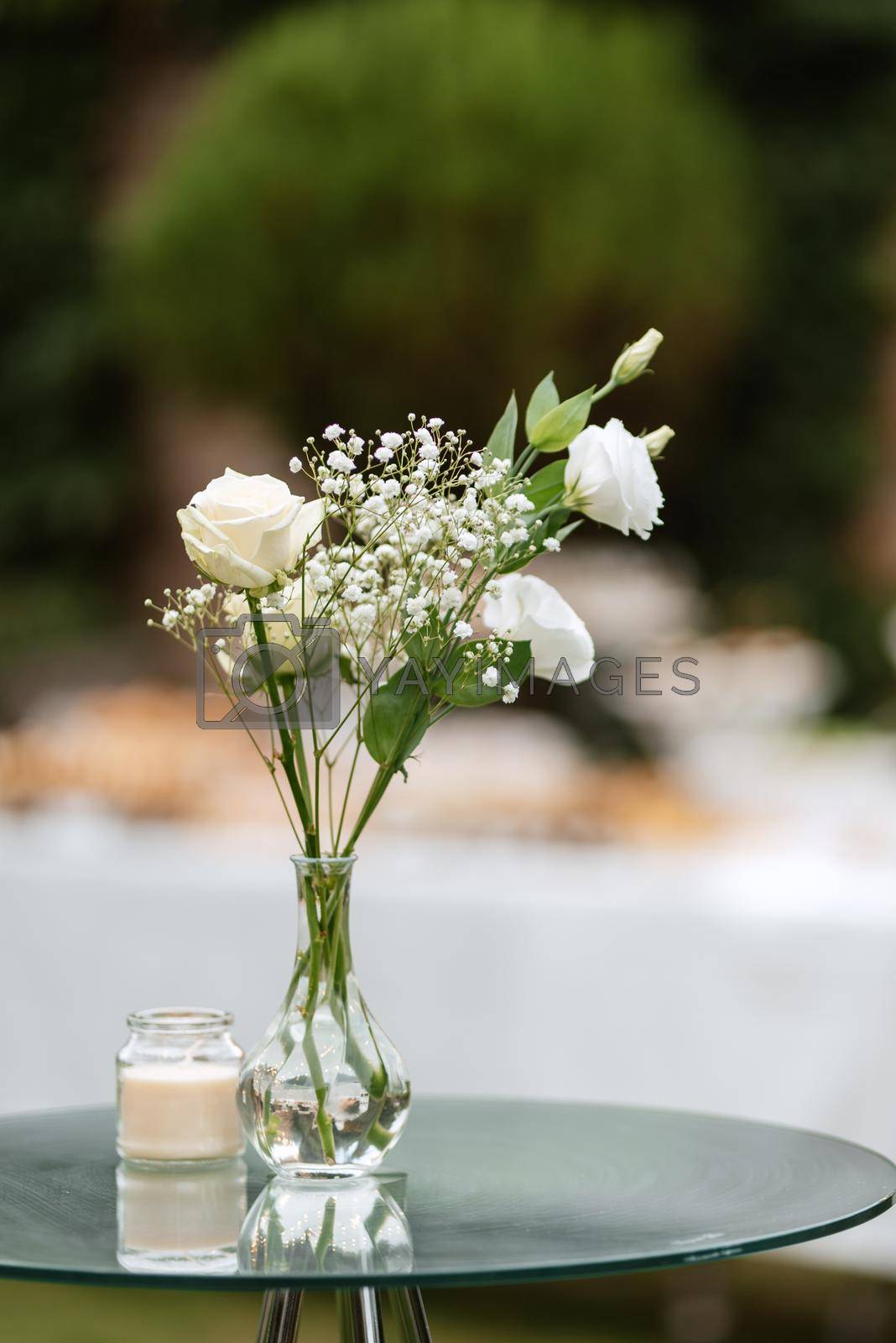 Royalty free image of wedding decor with natural flowers by Andreua
