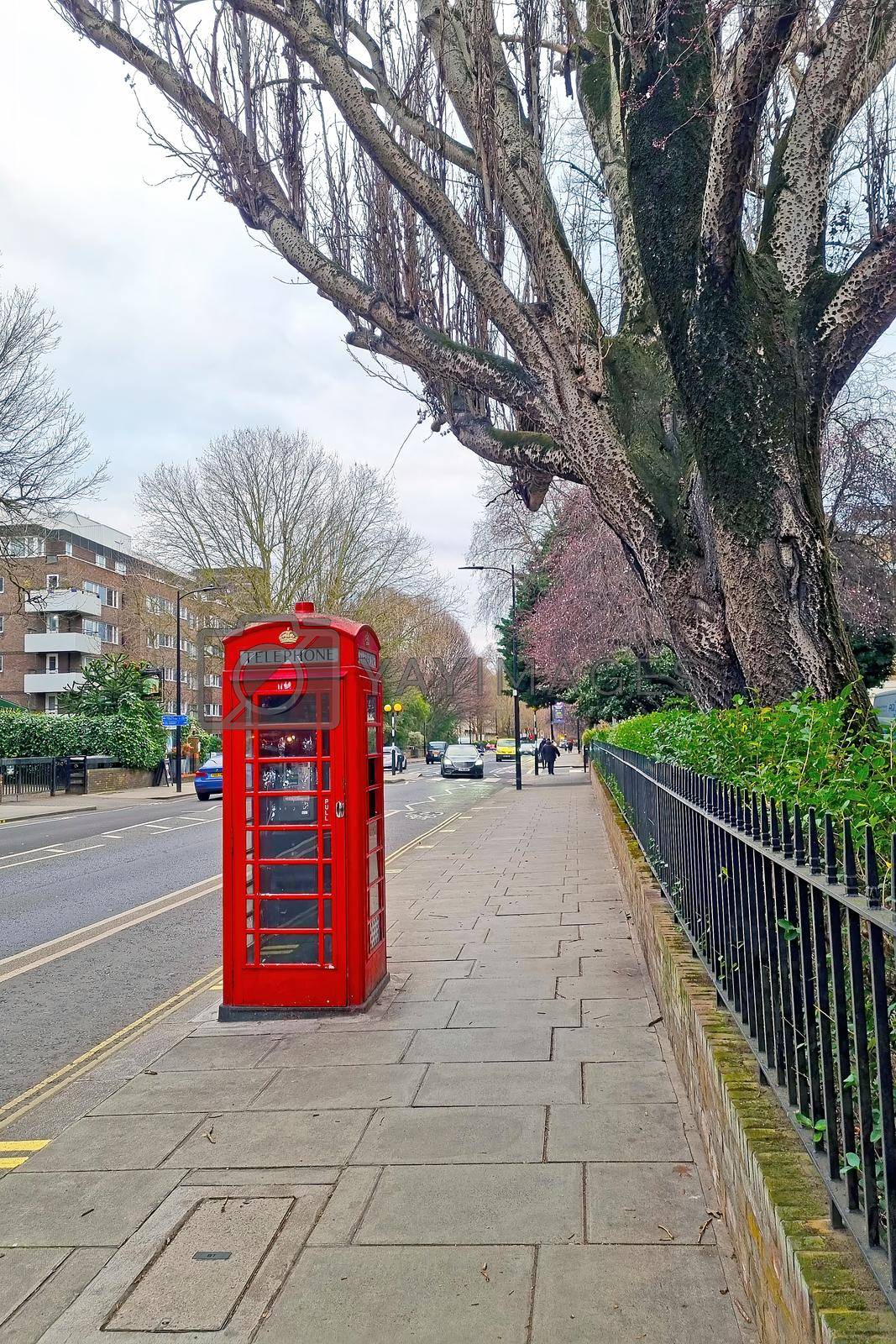 London, United Kingdom, February 9, 2022: the famous red telephone booth on the streets of London