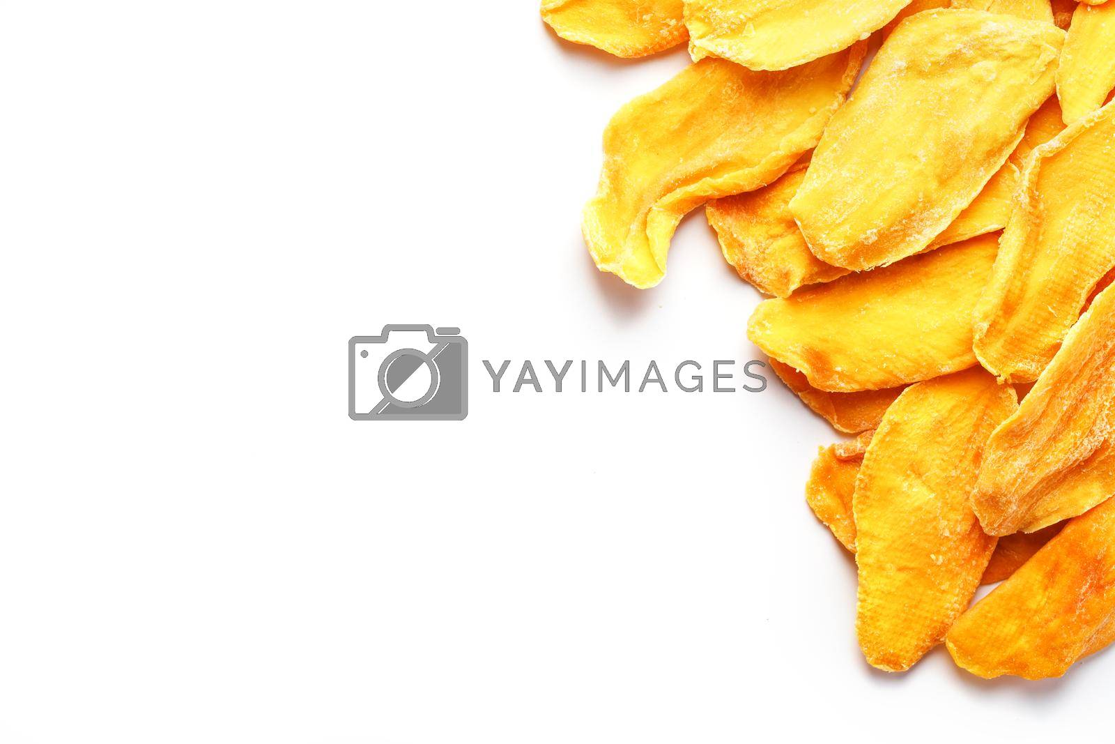 Royalty free image of Dried fruit slices from organic ripe mango by AlexGrec