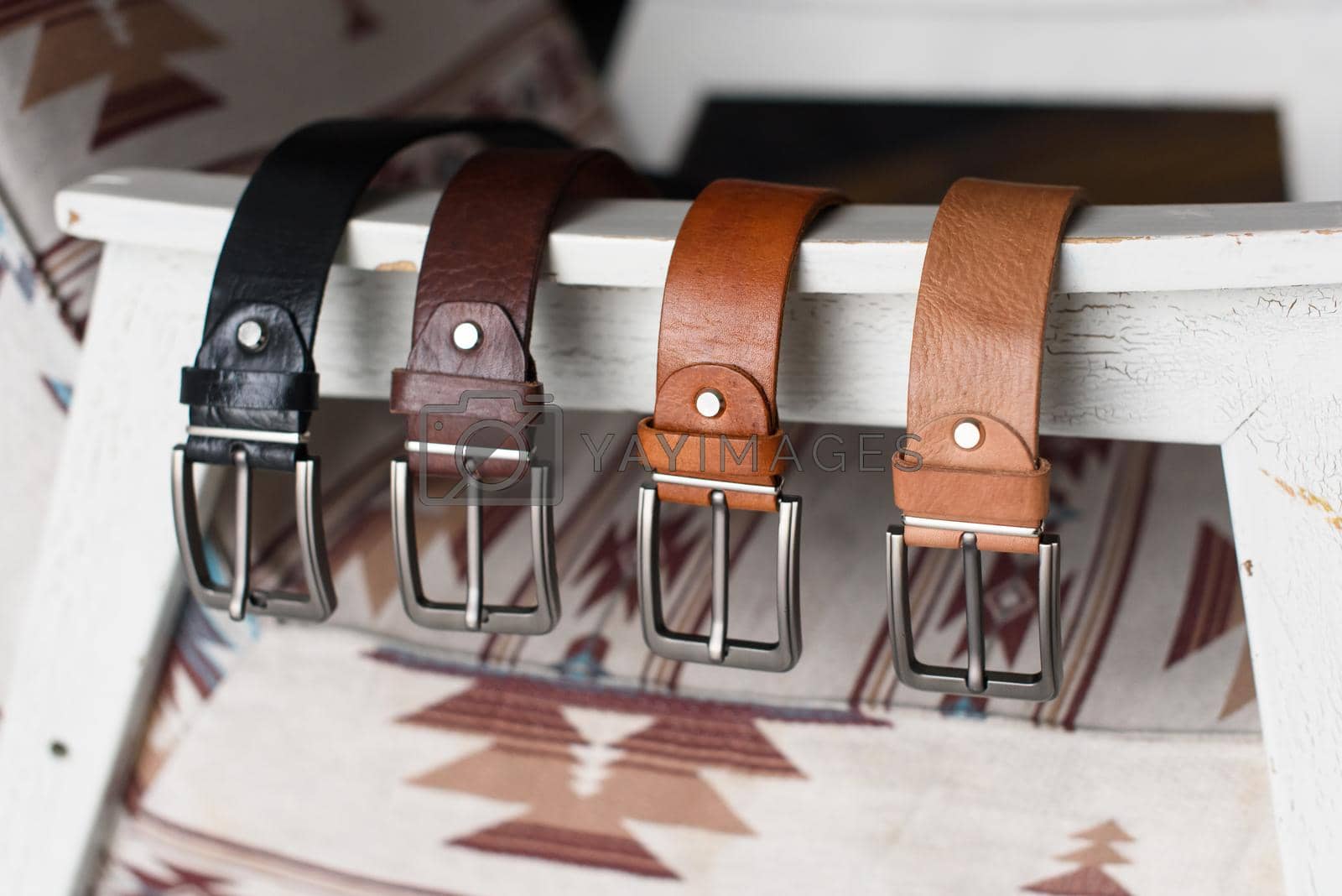 A set of colorful mens genuine sueded leather belts. fashion accessories.