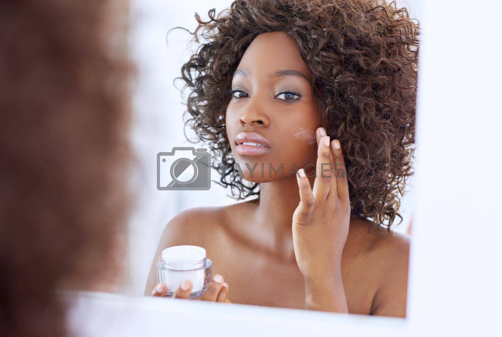 Shot of a beautiful young woman during her daily beauty routine.