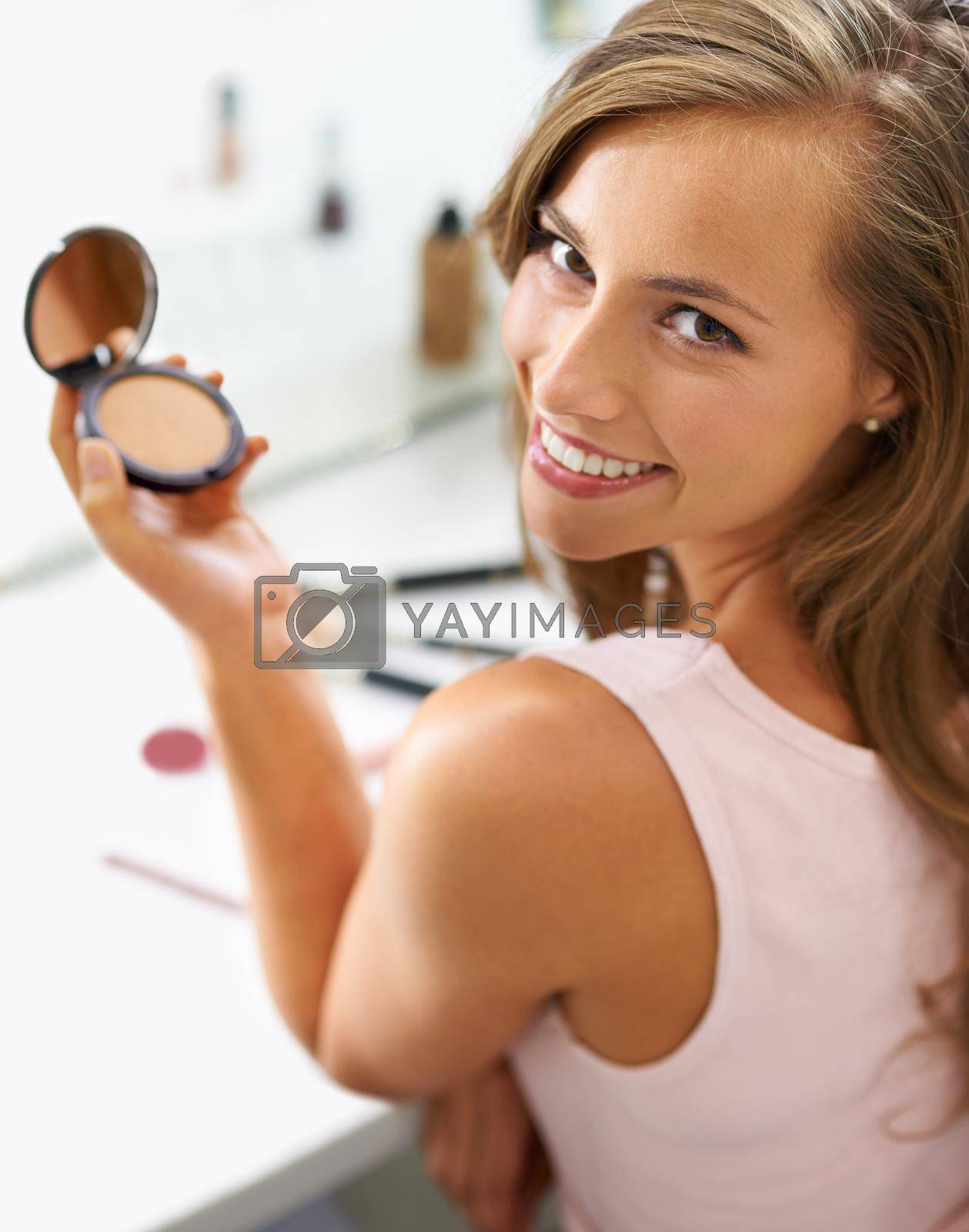 A beautiful young woman spending the day getting her hair and makeup done.