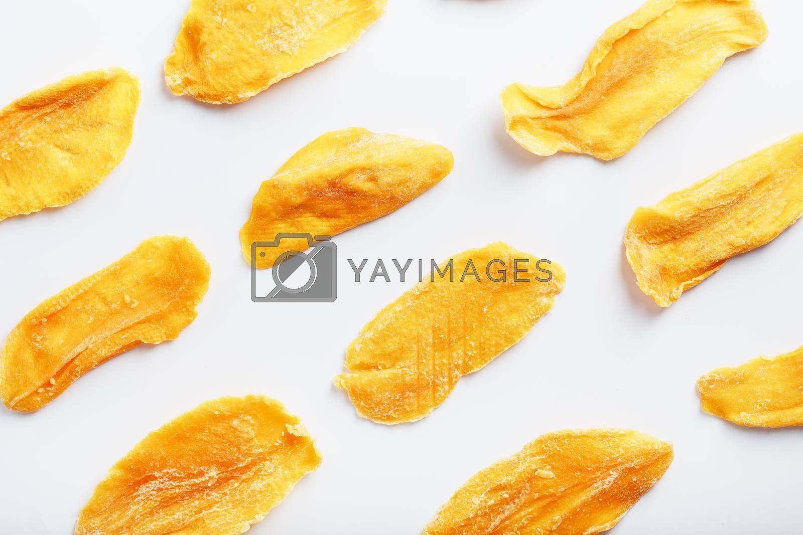 Royalty free image of Dried fruit slices from organic ripe mango by AlexGrec