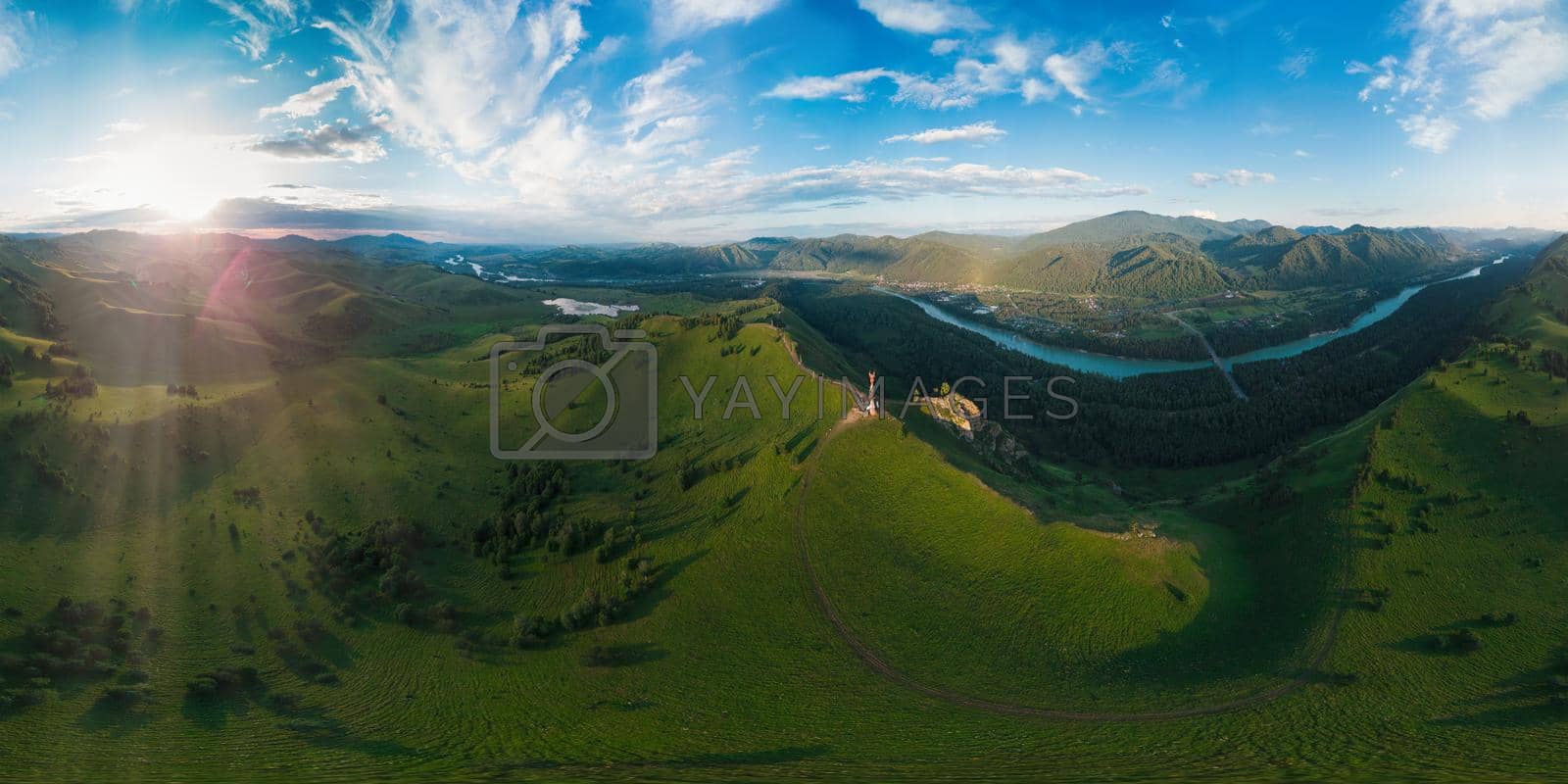 Aerial drone 360 panorama view of beauty dawn on the peak, in the mountains in Altay, summertime. The famous tourist place called the Devil's Finger on the border of the Altai Republic and the Altai Territory