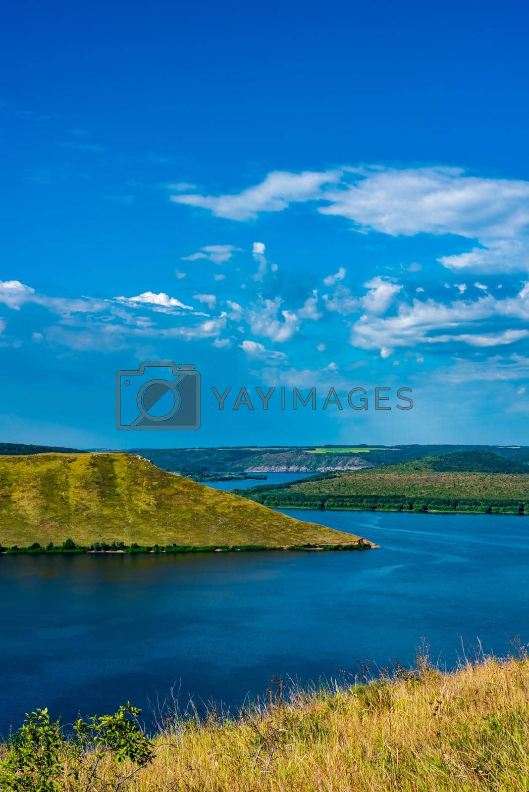 Landscape of beautiful River Dnister with Rocky Mountains in Bakota, Ukraine. Summer Travel serene minimalistic view .