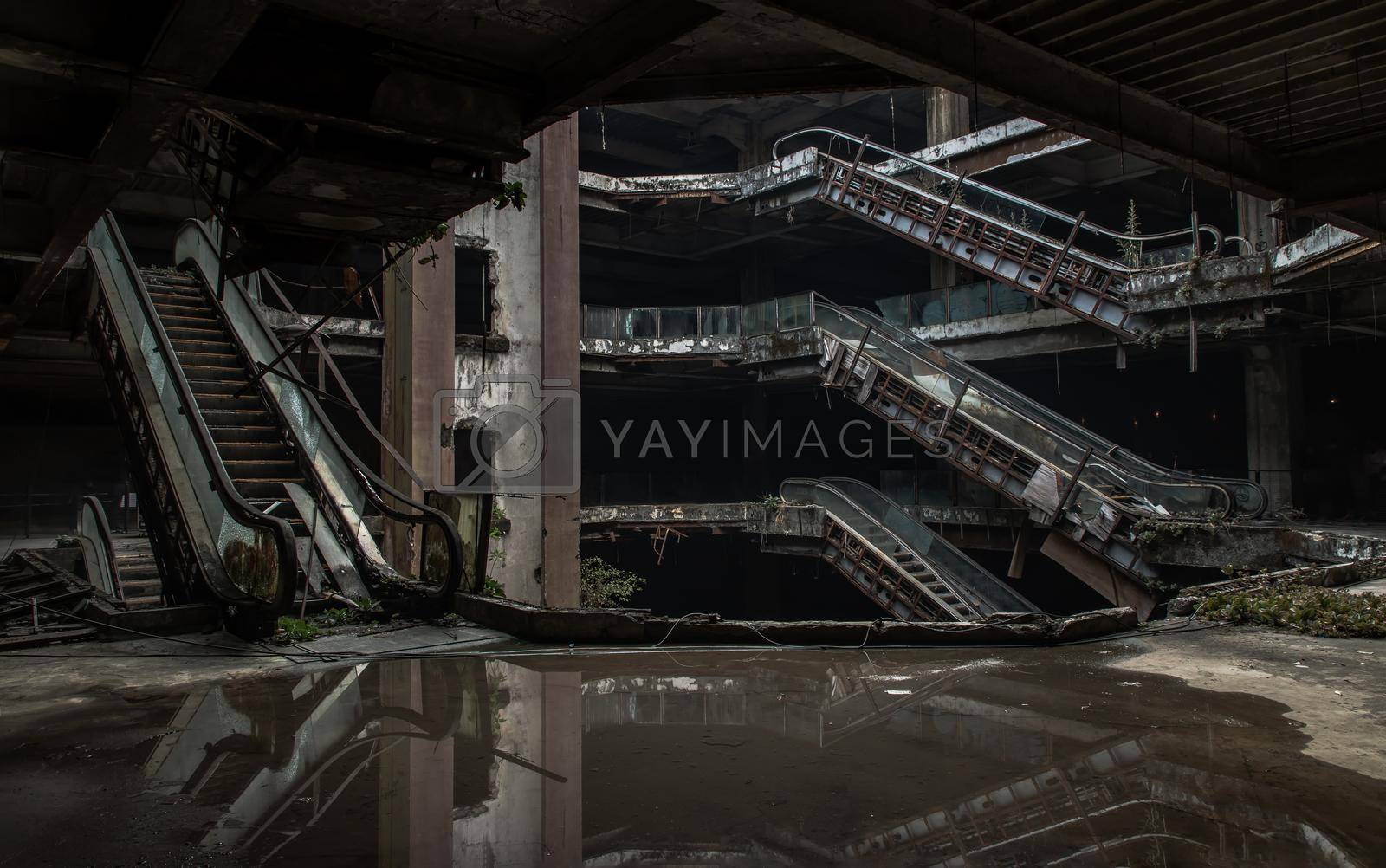 Bangkok, Thailand - 07 Feb 2022 : Damaged escalators and waterlogged in abandoned shopping mall building. Structural and ruins was left to deteriorate over time, New World Mall, No focus, specifically.
