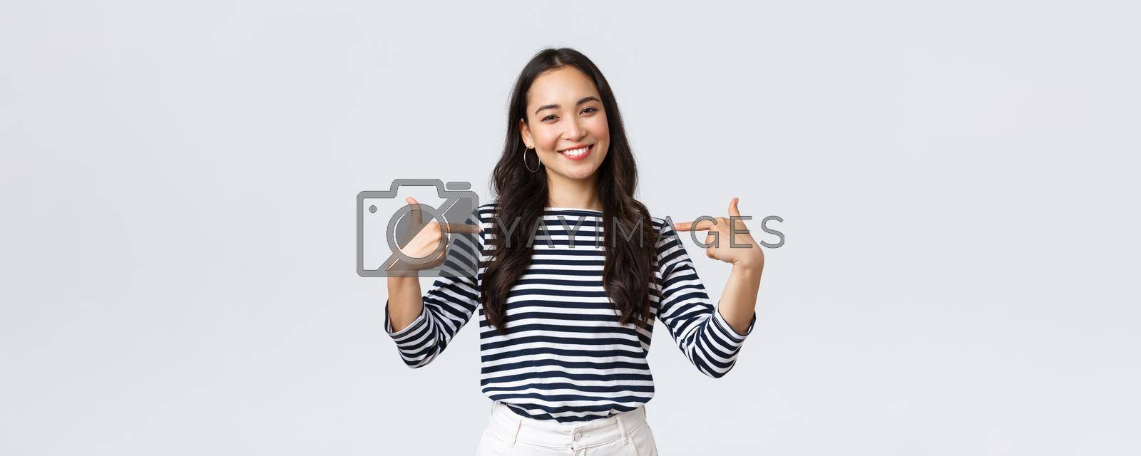 Lifestyle, beauty and fashion, people emotions concept. Smiling friendly-looking woman ready to help, pointing herself with pleasant look, bragging own accomplishments, whtie background.