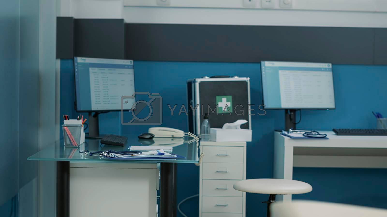 Royalty free image of Nobody in medical cabinet used by doctor to do physical examination by DCStudio
