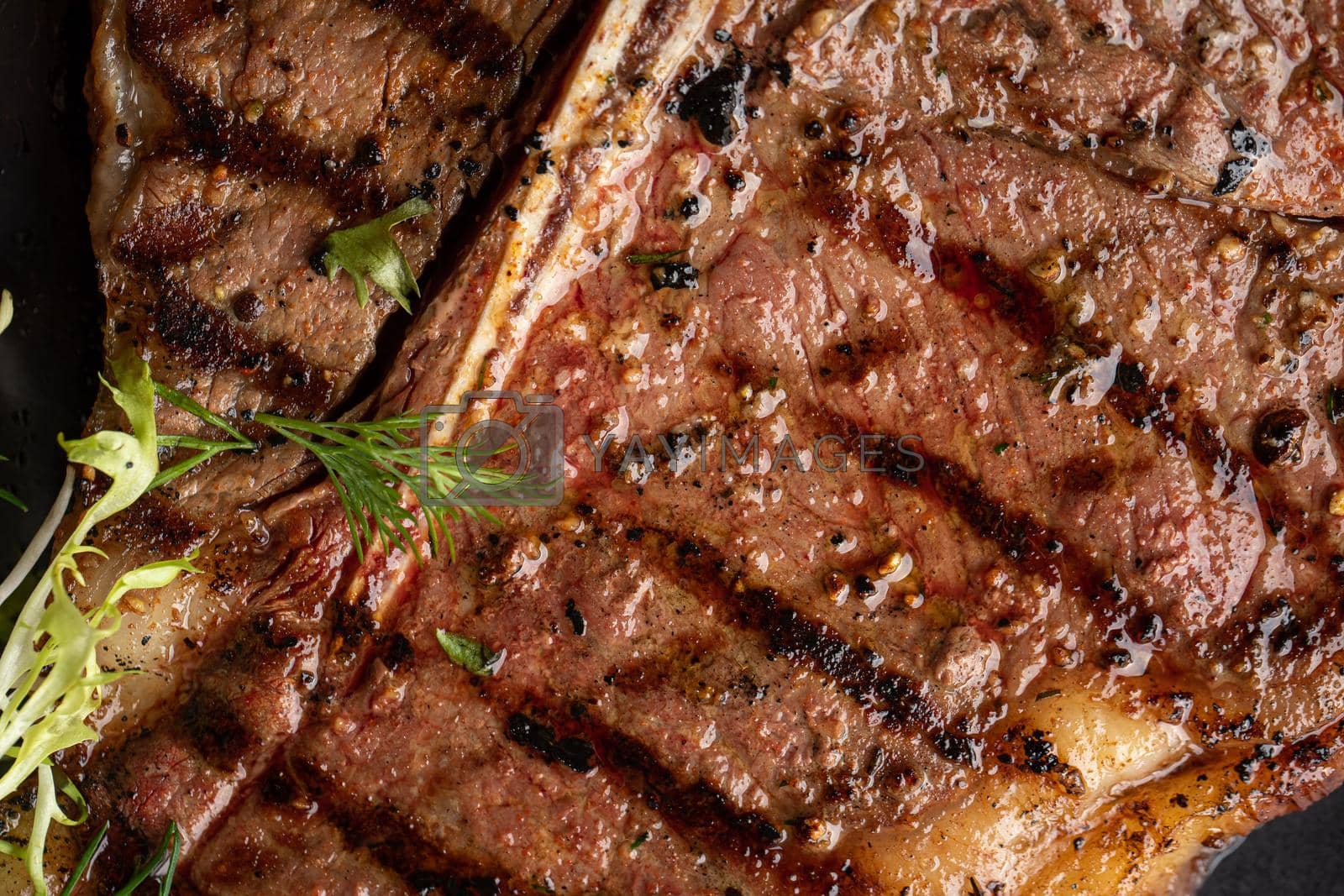Closeup on juicy grilled beef steak texture background