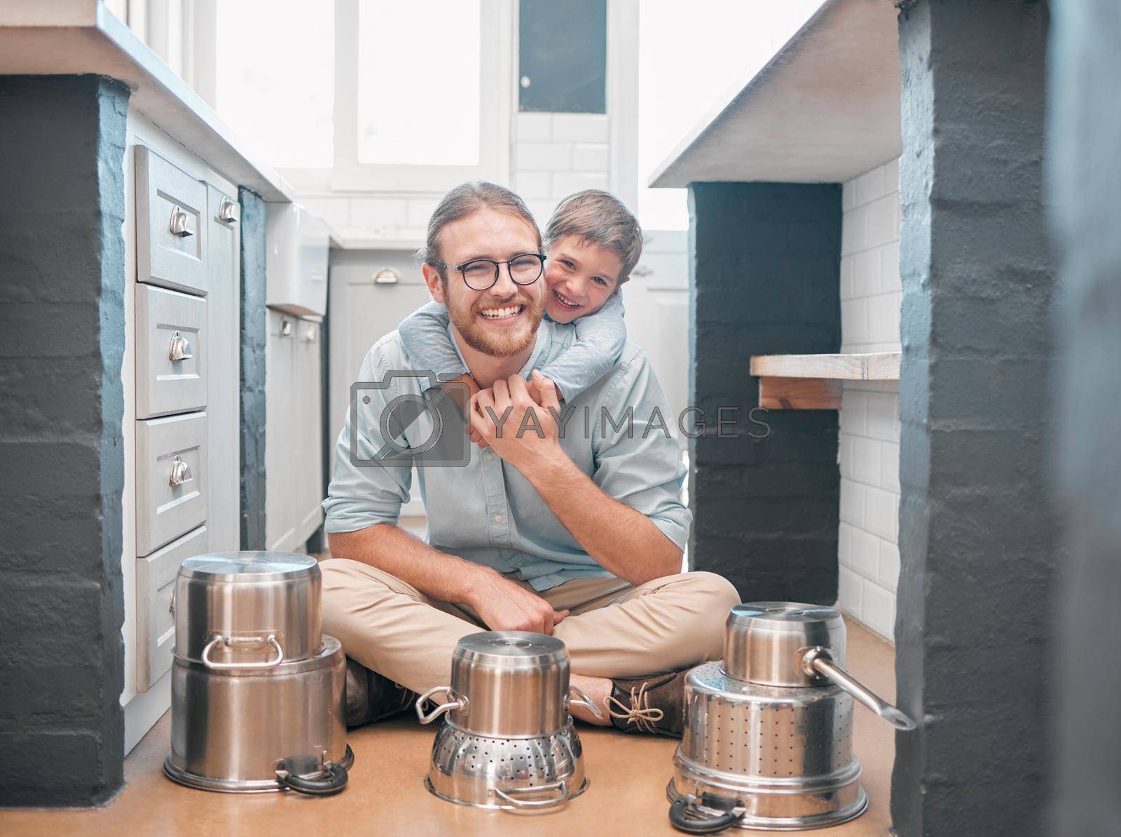 Shot of a father and son in the kitchen.