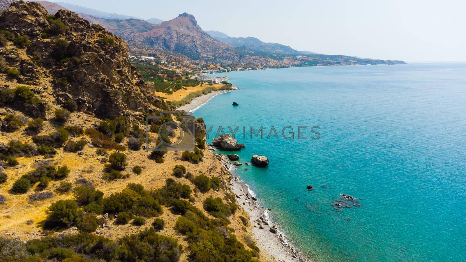 Greece, Crete, landscape with olive trees and tiny mountain village.