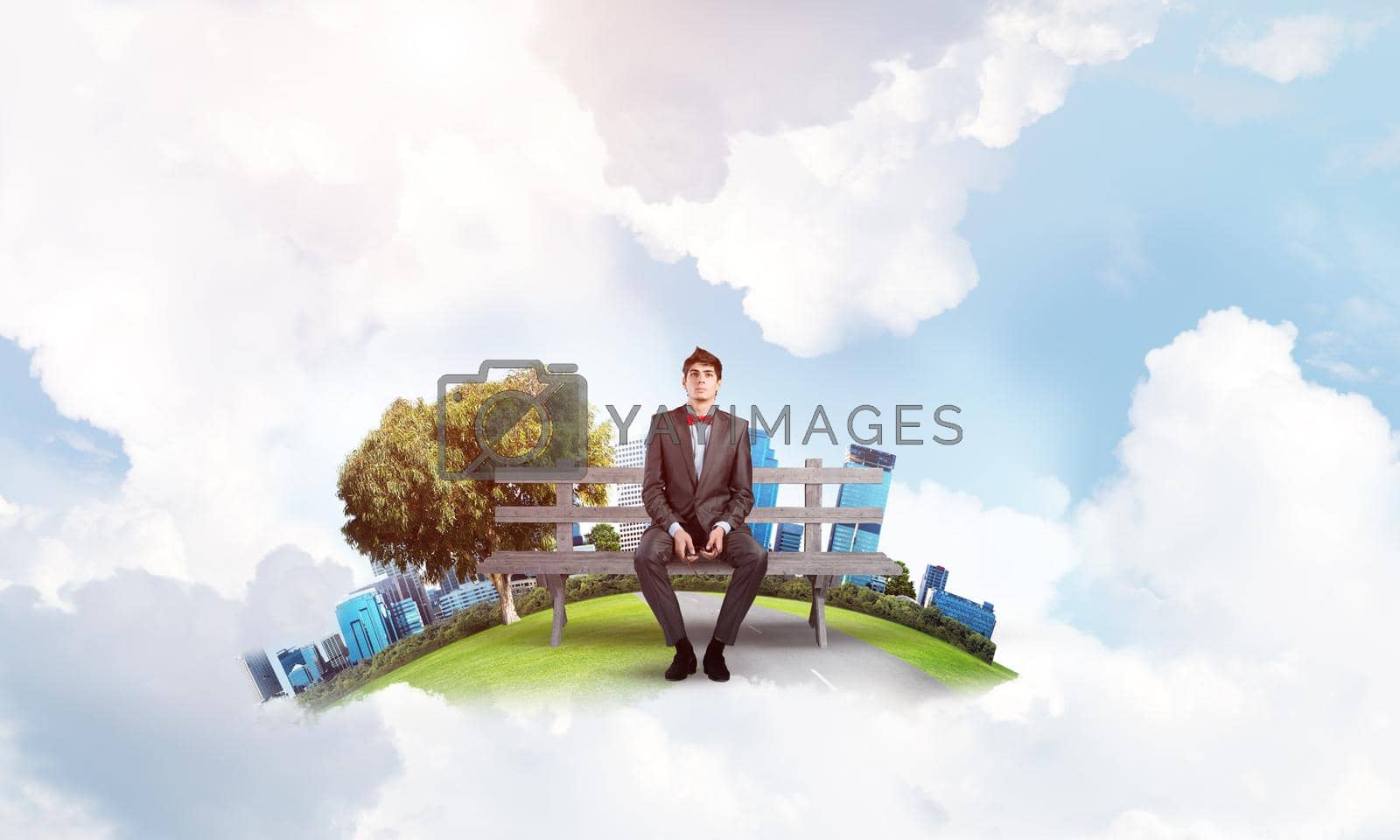 Royalty free image of young student on a bench by adam121