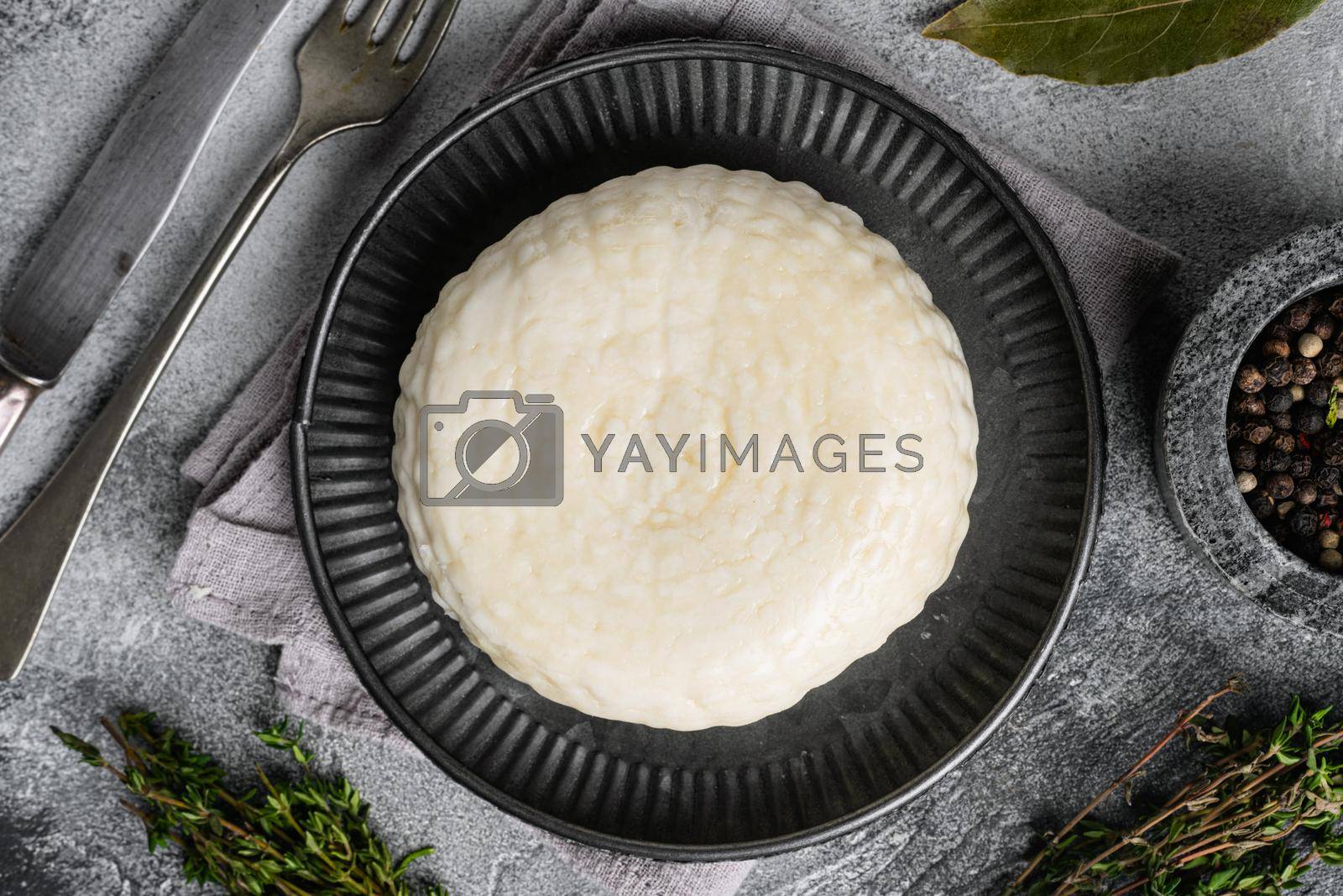 Royalty free image of Regular tofu , on gray stone table background, top view flat lay by Ilianesolenyi