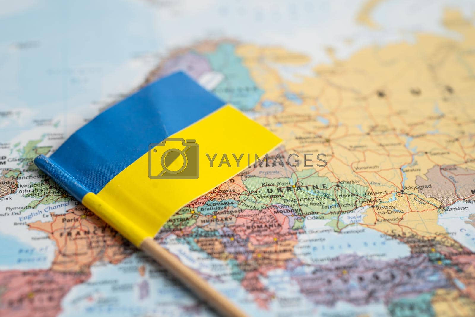 Bangkok, Thailand - February 1, 2022 Ukraine flag on world map background.