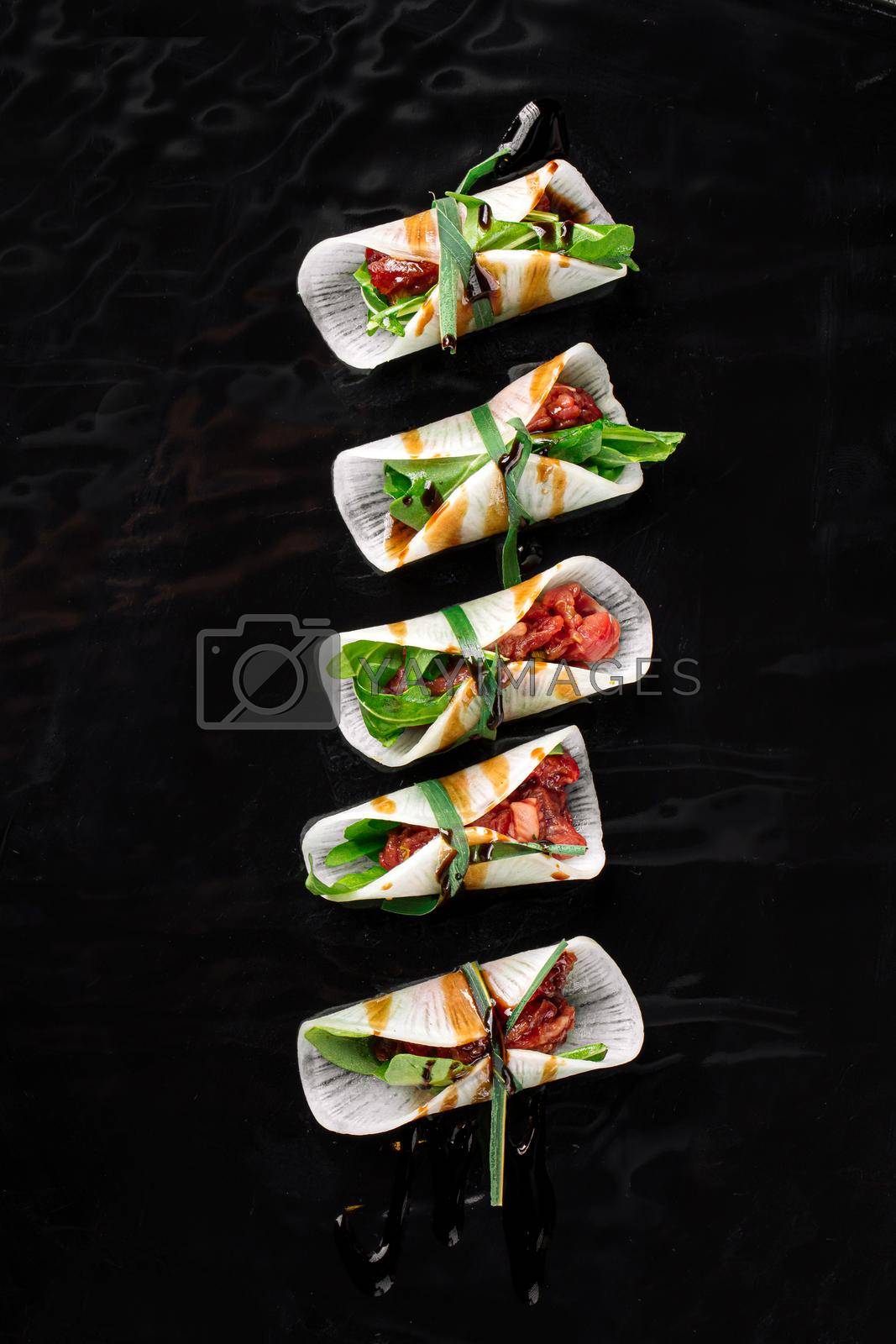 Royalty free image of Veal tartare with daikon appetizer by Hihitetlin