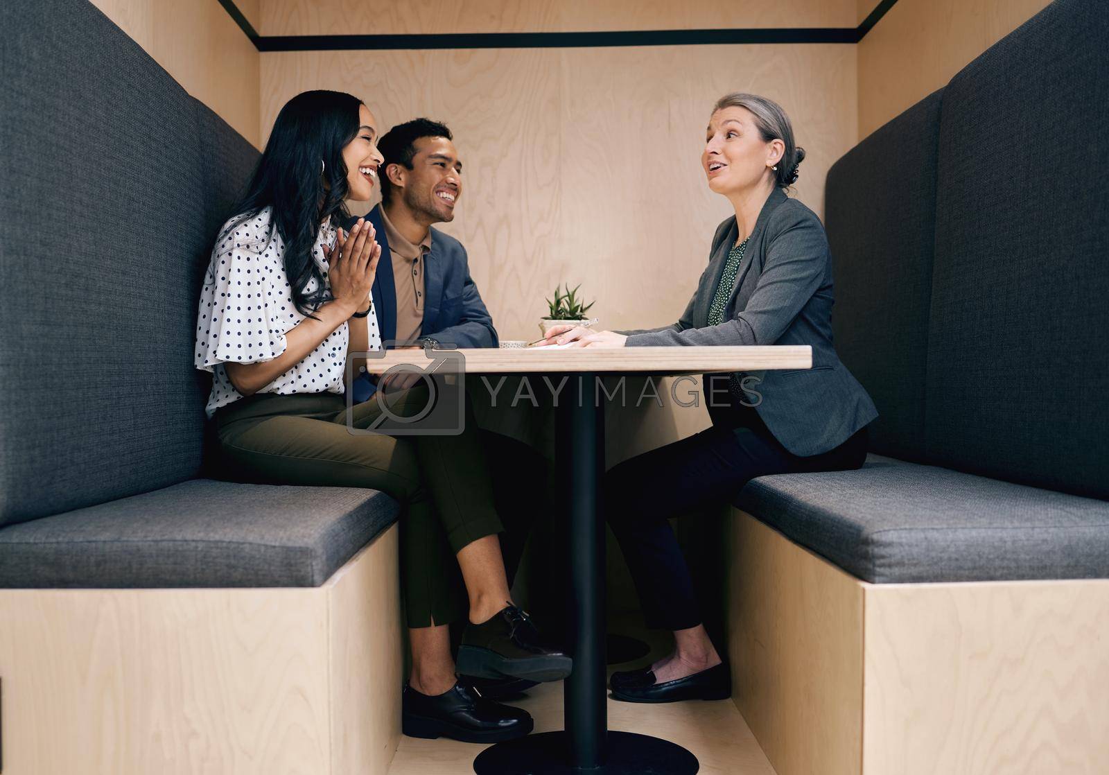 Royalty free image of Making the wise choice and hiring a financial advisor. Full length shot of an affectionate young couple meeting with their mature female financial advisor. by YuriArcurs