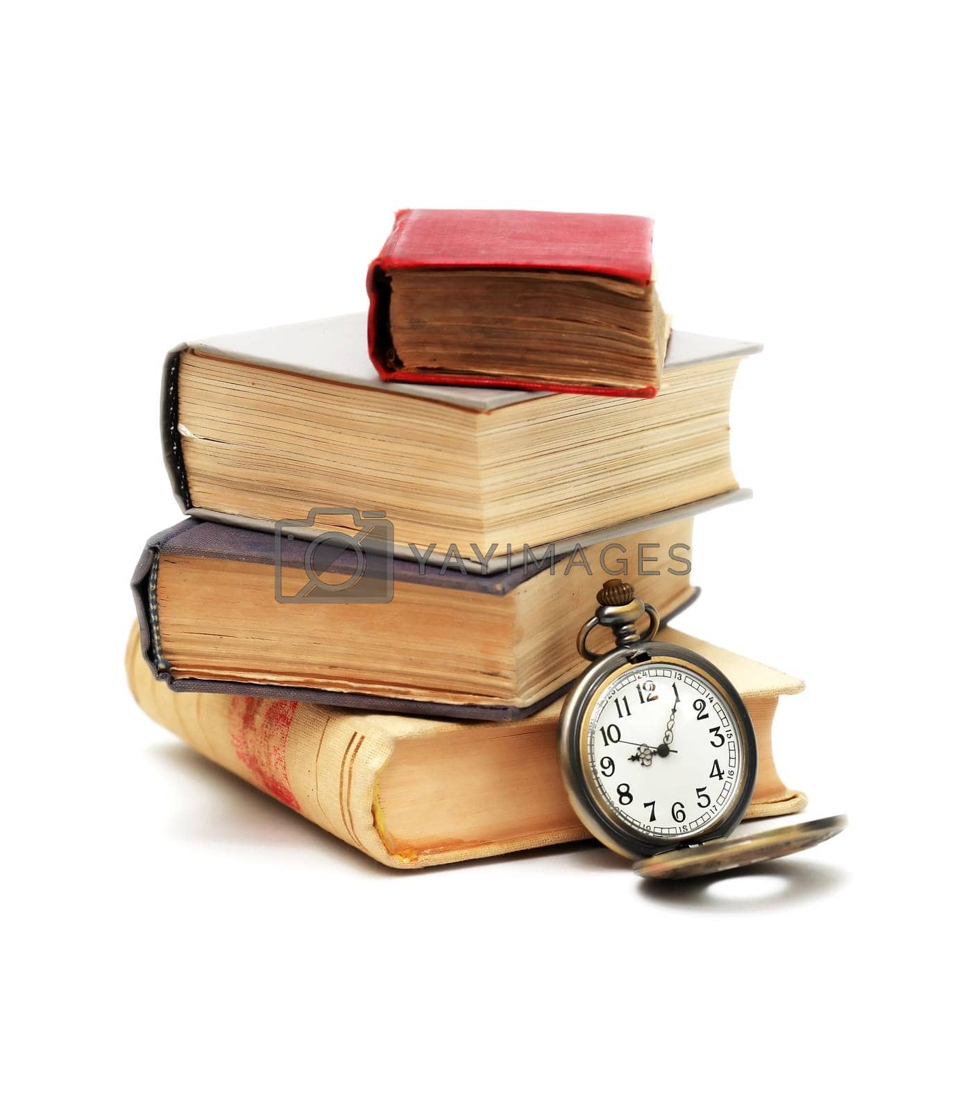 Education concept. Stack of books near pocket watch on white background