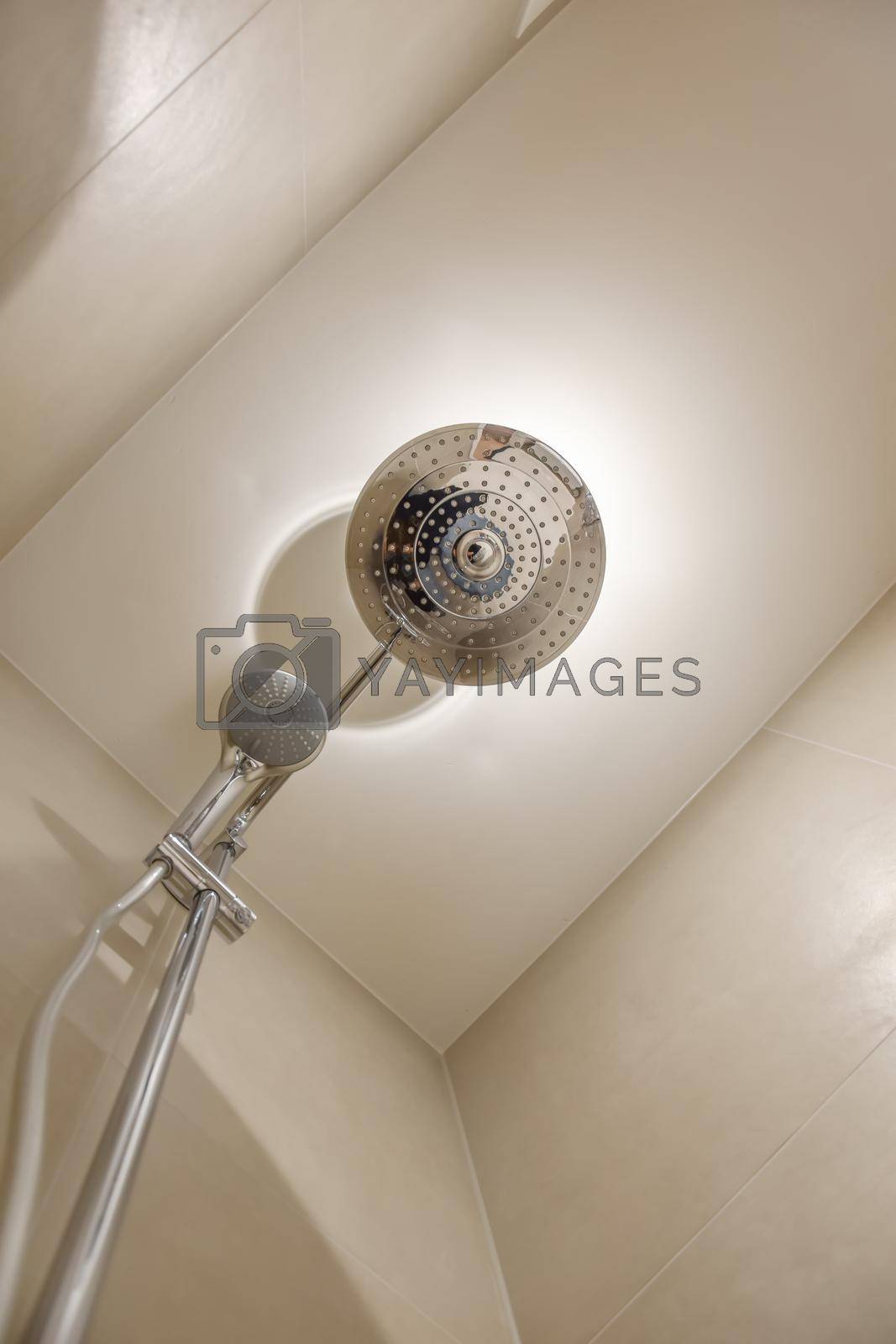 Royalty free image of Shower cabin lined with beige tiles by casamedia