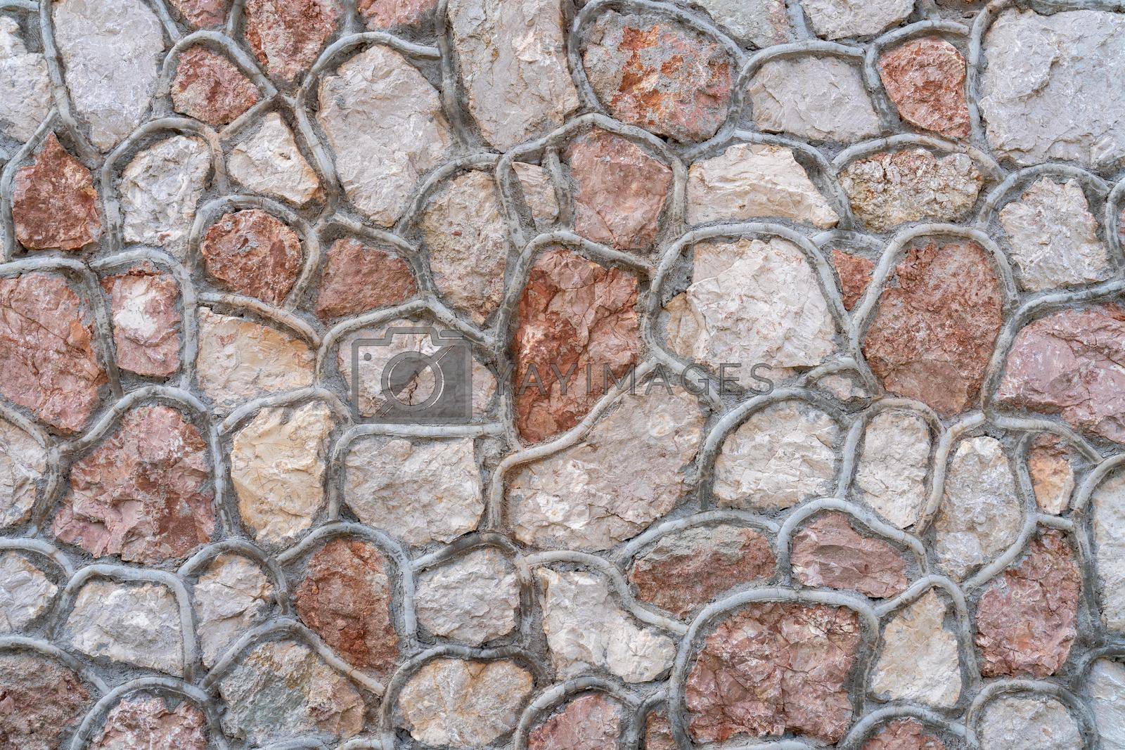 Royalty free image of Pattern of decorative stone wall background. Stone wall texture abstract wall. by Matiunina