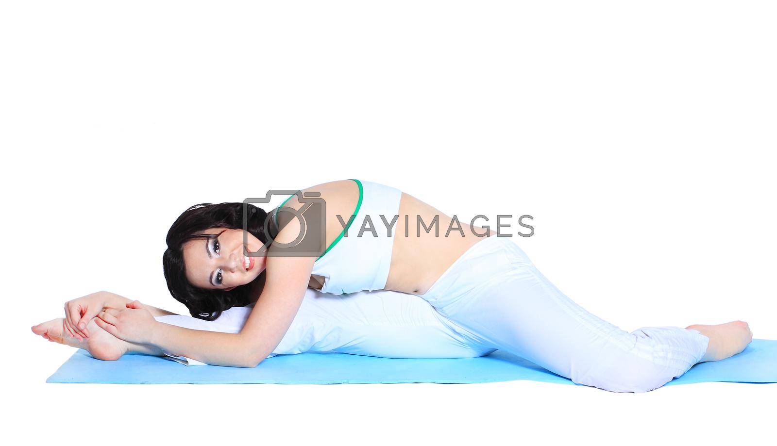 young woman in yoga pose on isolated white background