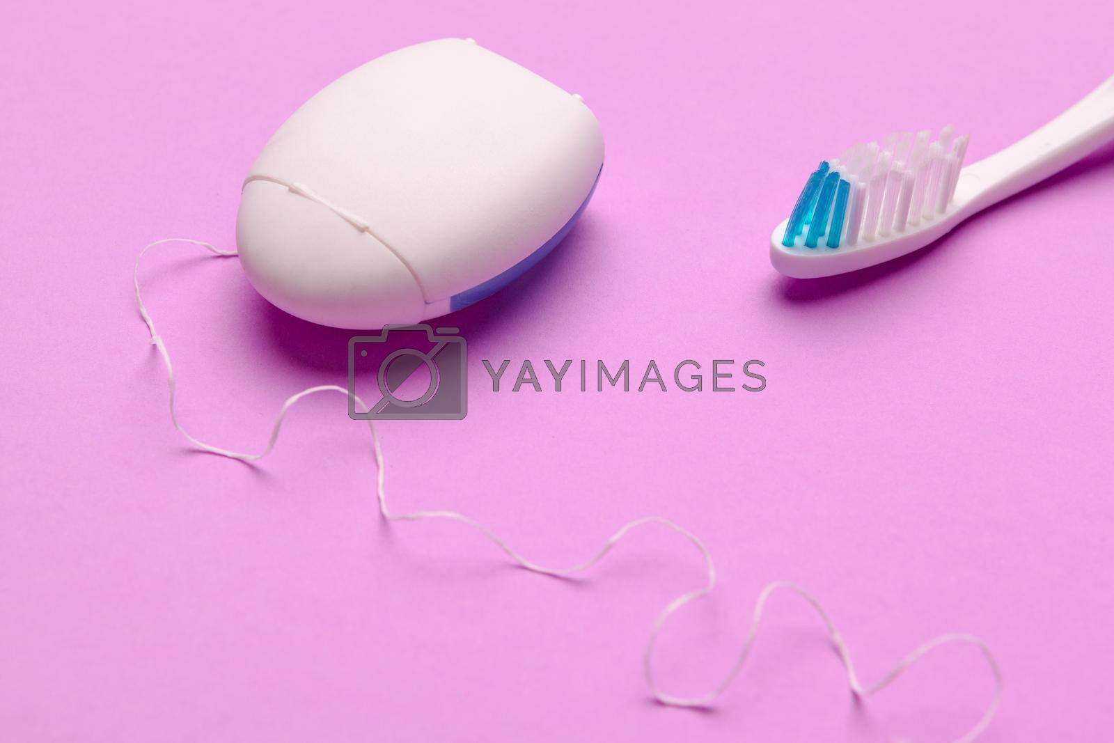 Taking care of teeth, dental concept on color background. Close up.