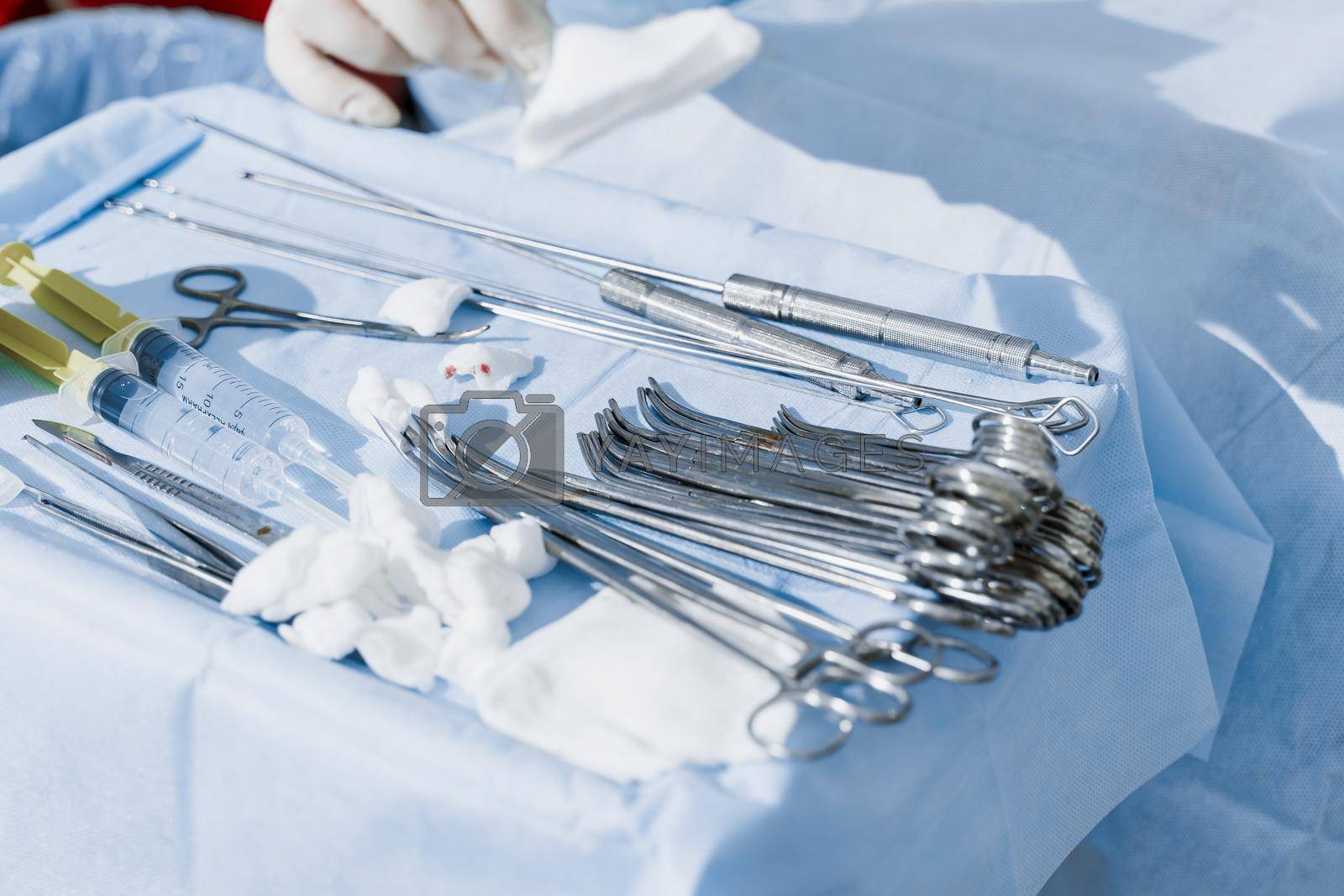 Royalty free image of Surgical stainless equipment on the sterille table in operation room. by Rabizo
