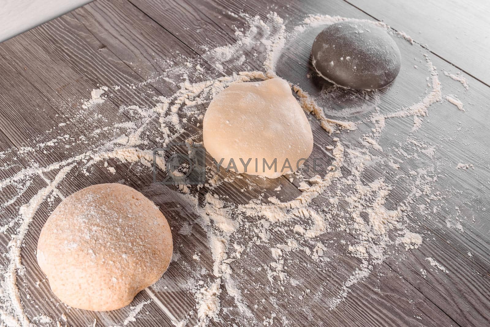 Royalty free image of Dough ball with flour. Cooking pizza with italian white dough. Food blanks in restaurant by Rabizo