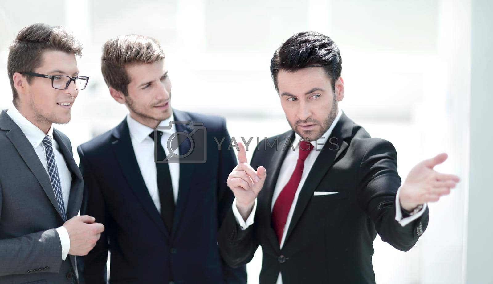 businessman talking to business partners.the concept of cooperation