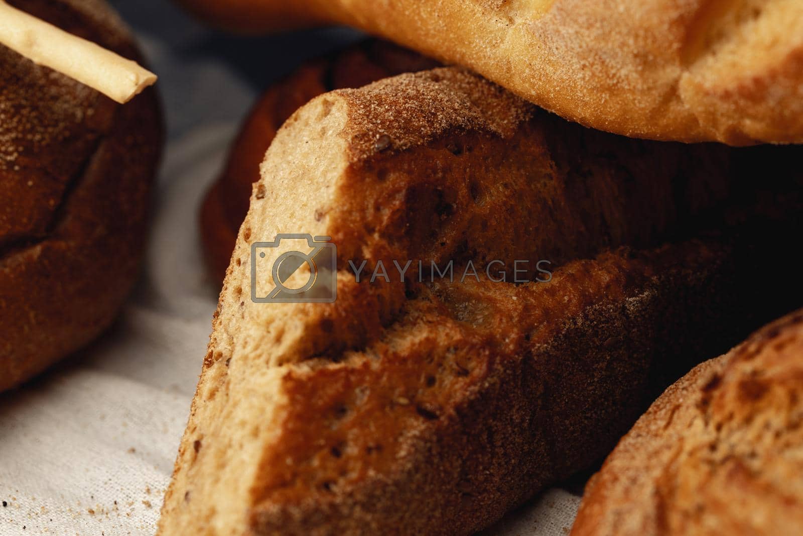 Royalty free image of Macro shot of freshly baked bread loaf by Fabrikasimf