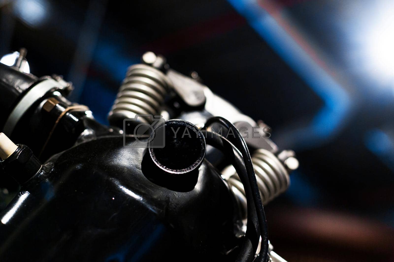 Royalty free image of Close-up of a detail of a rare car engine. Metal mechanisms. Automotive industry by Try_my_best